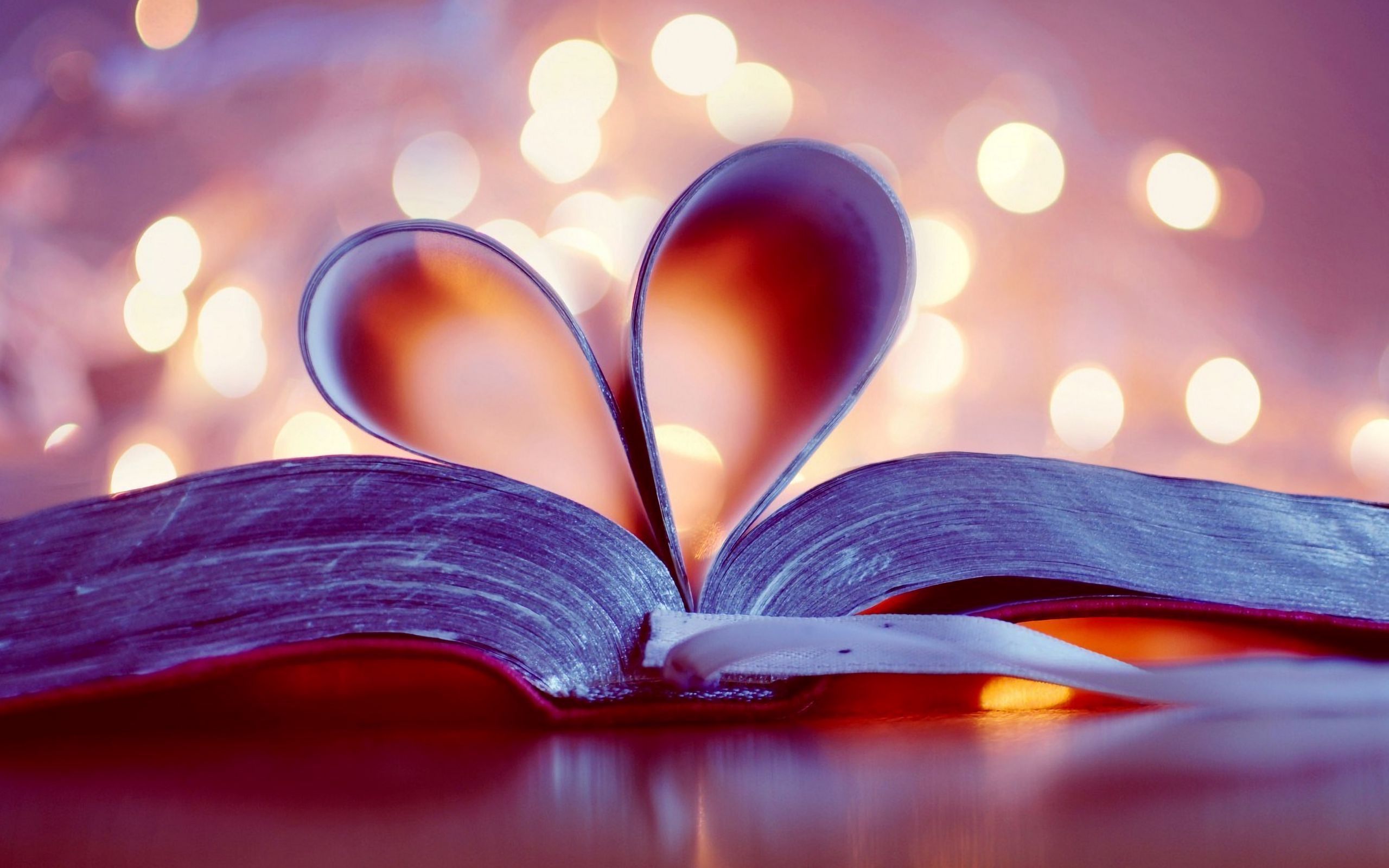 Download wallpaper 2560x1600 book, heart, page, glare, bookmark widescreen 16:10 HD background