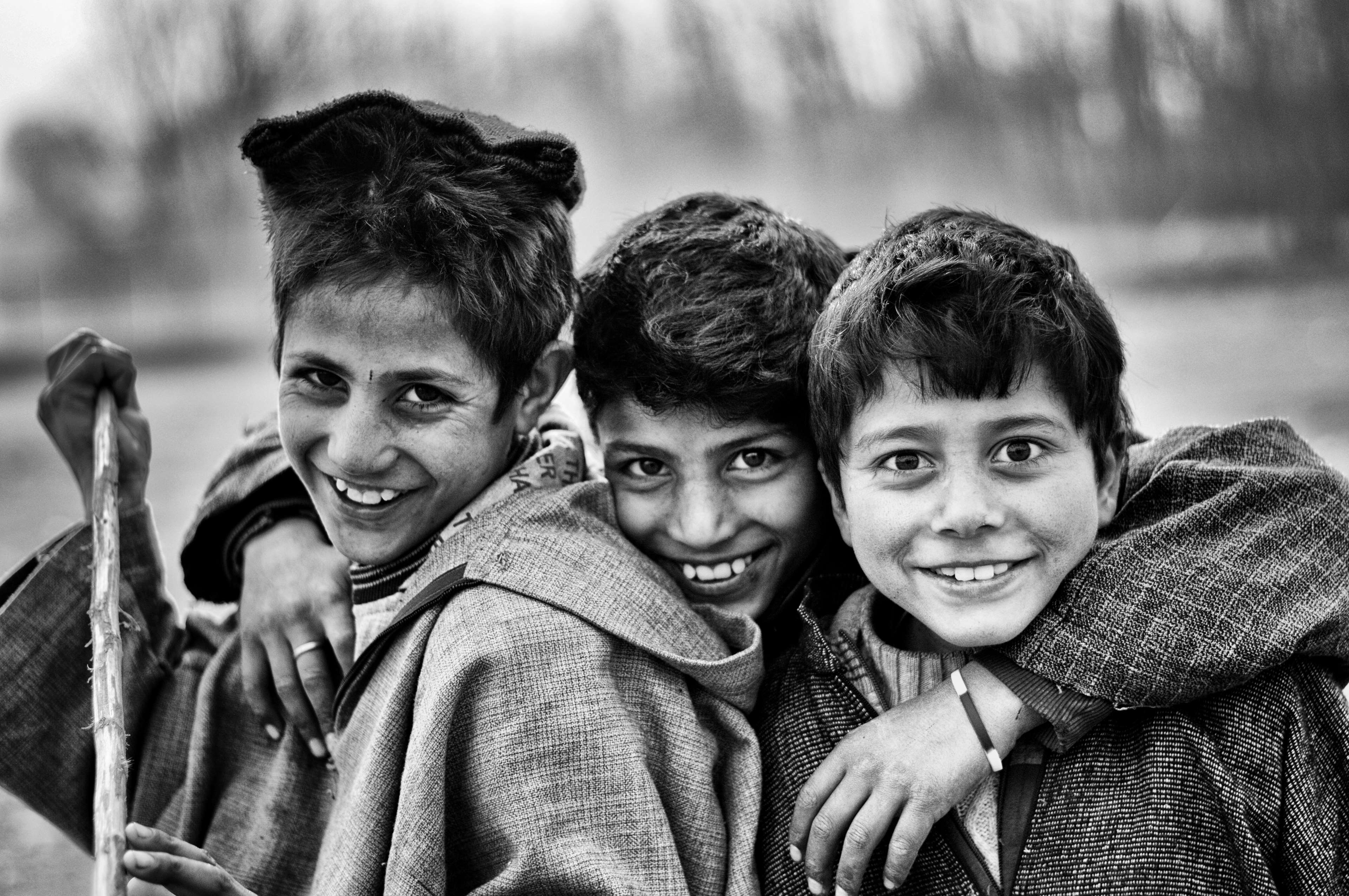 black and white, boys, childhood, climate, clothes, eyes, face, friends, hugging, kids, laughing, party, portrait, smiley, smiling, teeth, village, winter 4k wallpaper. Mocah HD Wallpaper