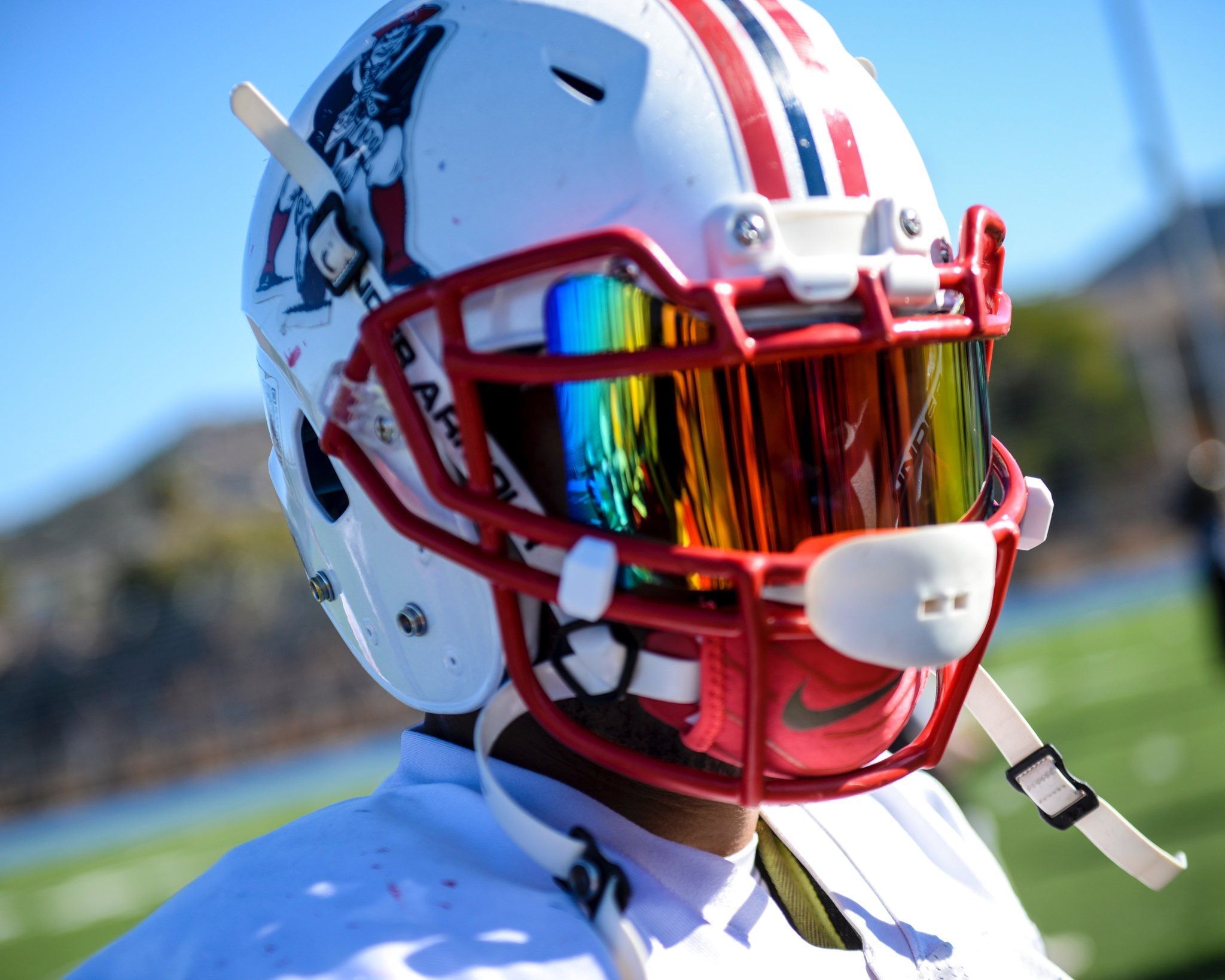 SHOC Red Iridium Visor on a Schutt Vengeance Patriots football helmet. Football helmets, Football, Football swag