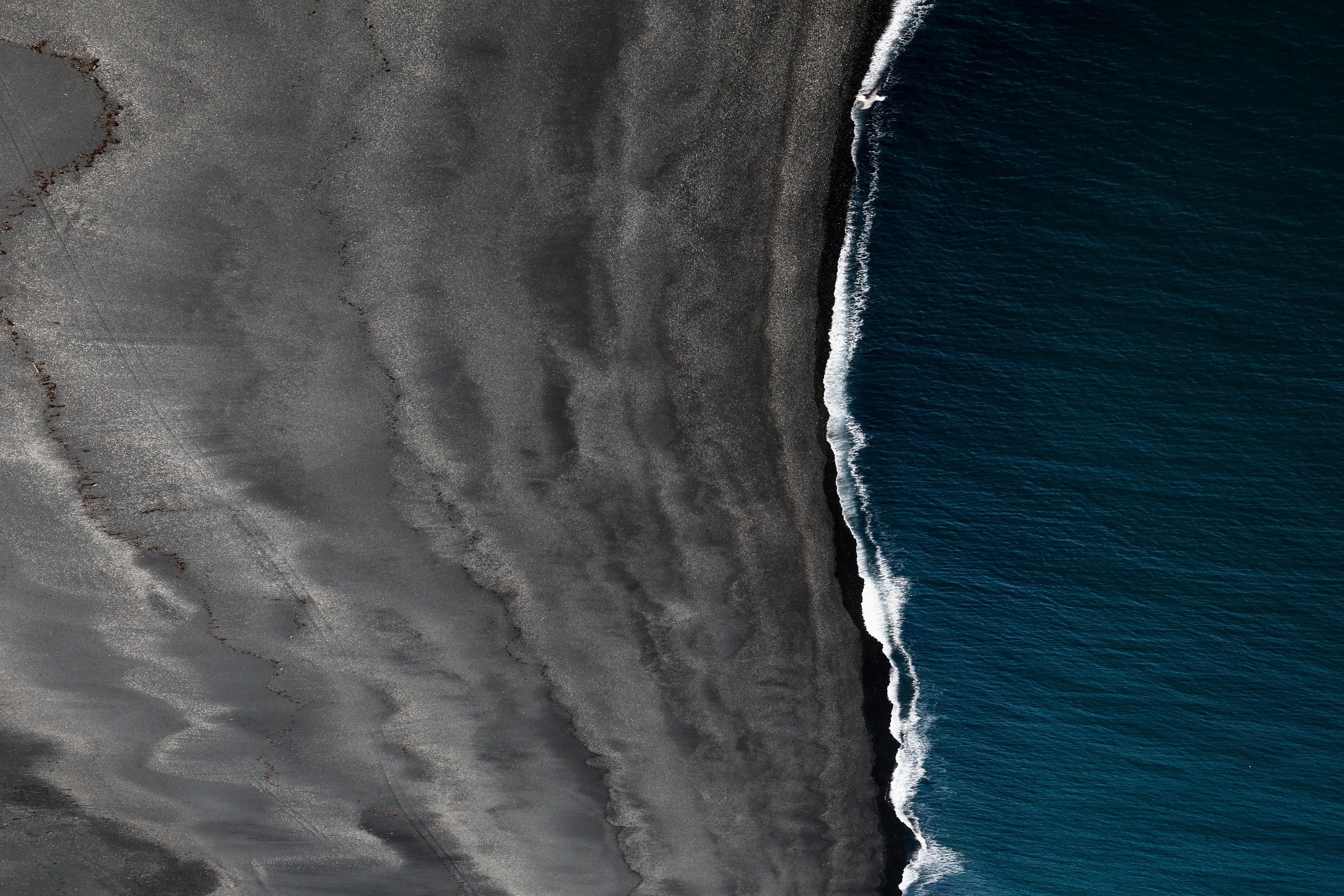 Photo by Jeremy Bishop. Sand picture, Black sand, Image