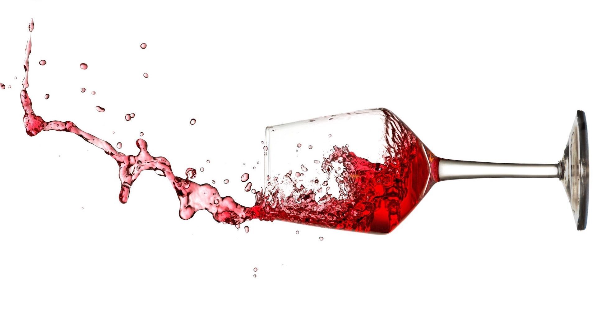 Red Wine Poured in Wine Glass Wallpaper