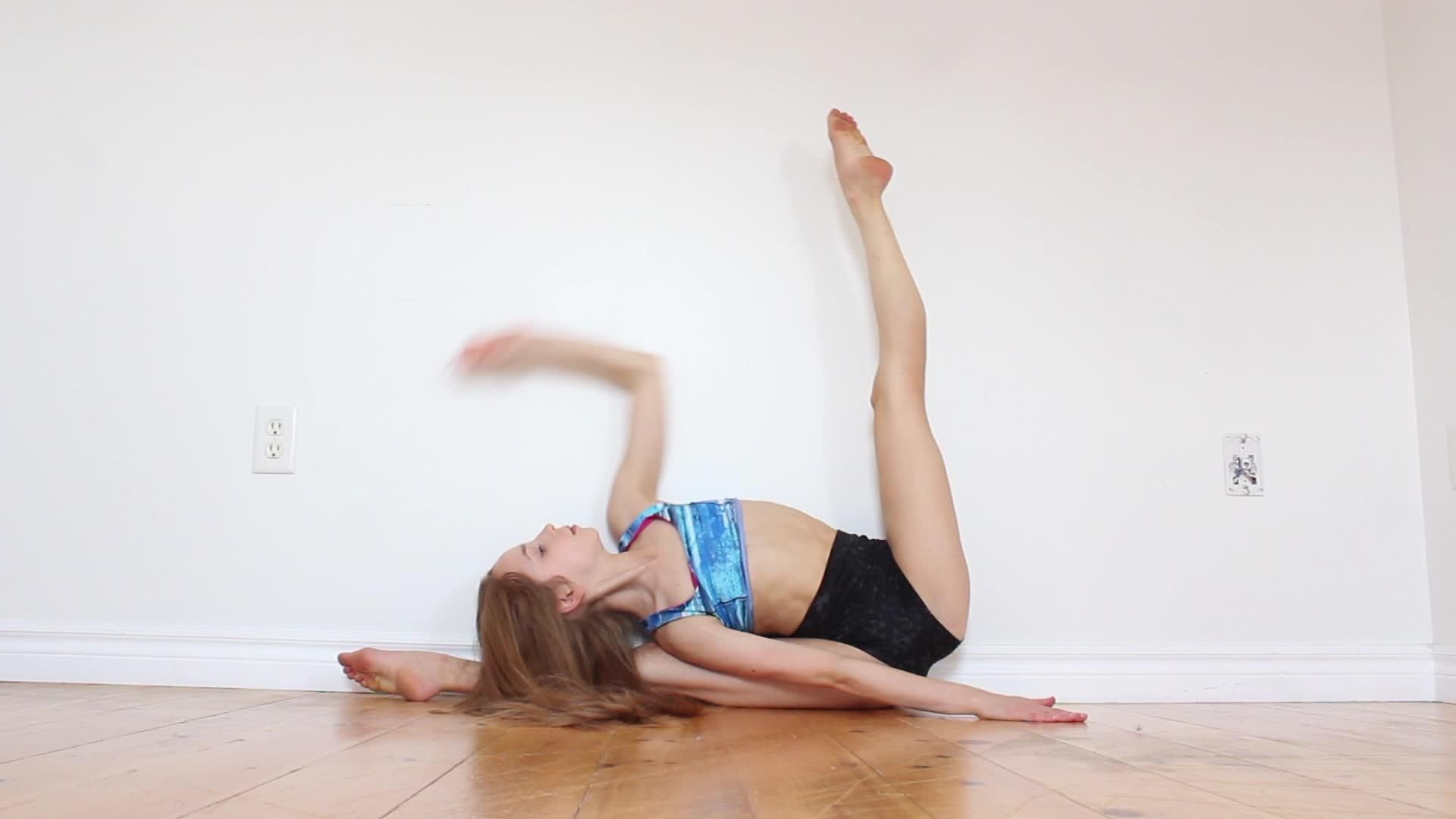 Girl Slides into Angled Splits. Jukin Media Inc