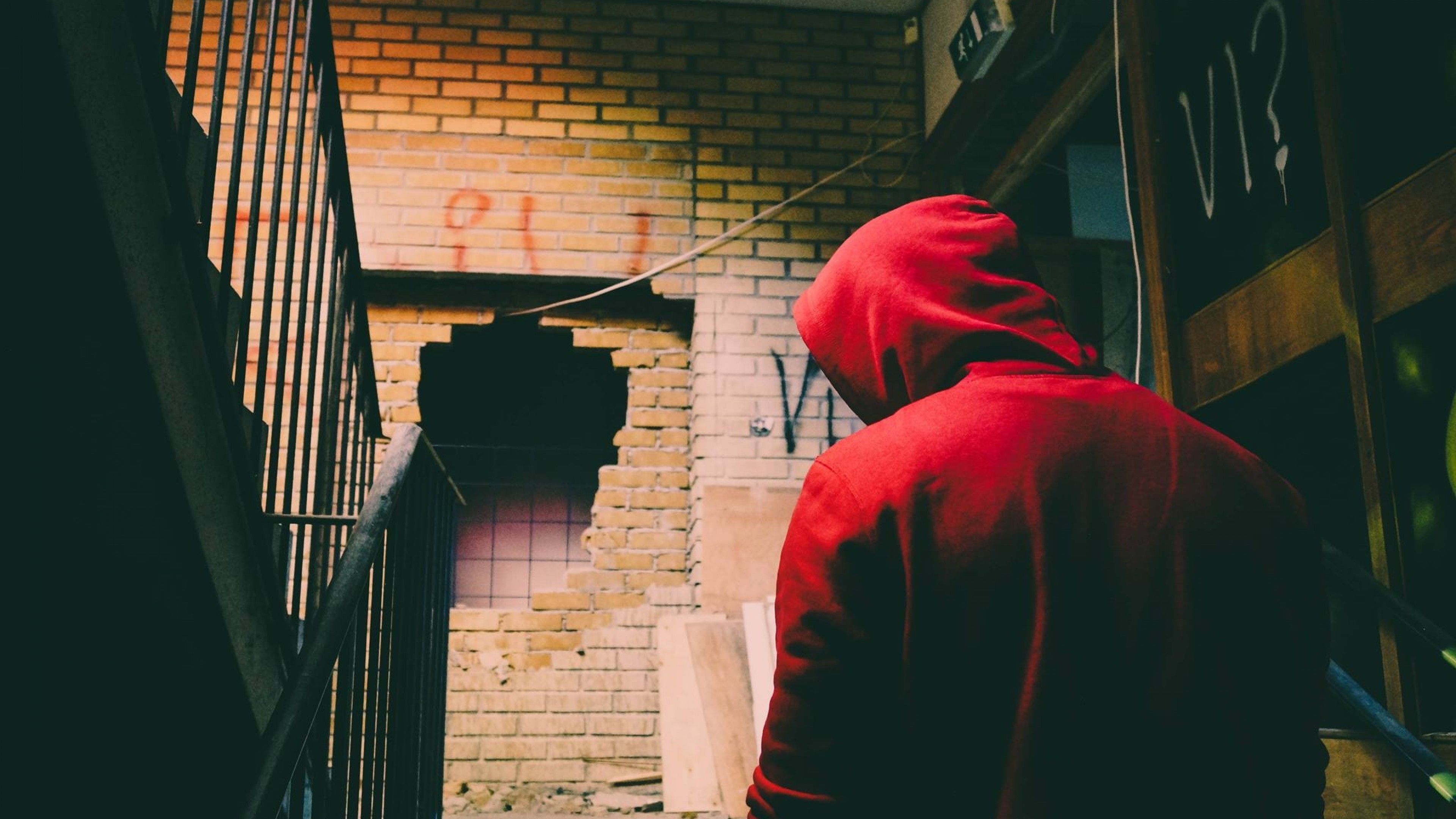 Download 3840x2160 Man, Red Hoodie, Staircase, Abandoned Wallpaper for UHD TV