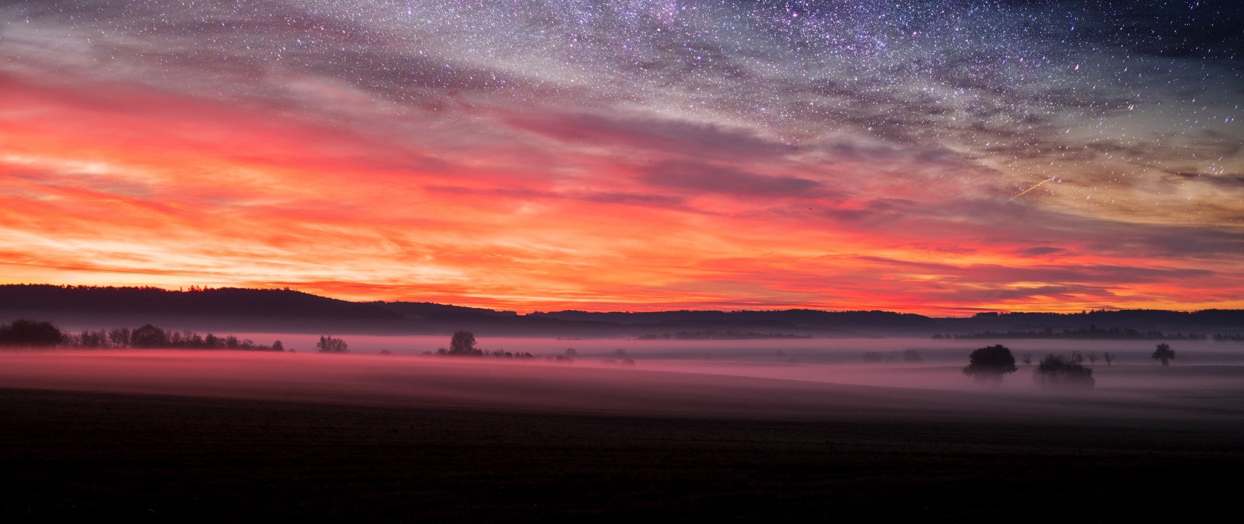 Download wallpaper 2560x1080 field, starry sky, fog, evening, landscape, autumn dual wide 1080p HD background