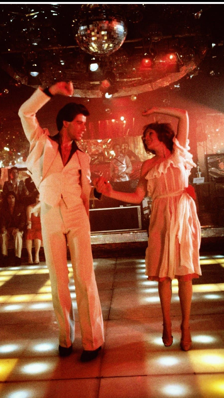 John Travolta as Tony and Karen Lynn Gorney as Stephanie in the 1977 film Saturday Night Fever. Saturday night fever, Night fever, Karen lynn gorney