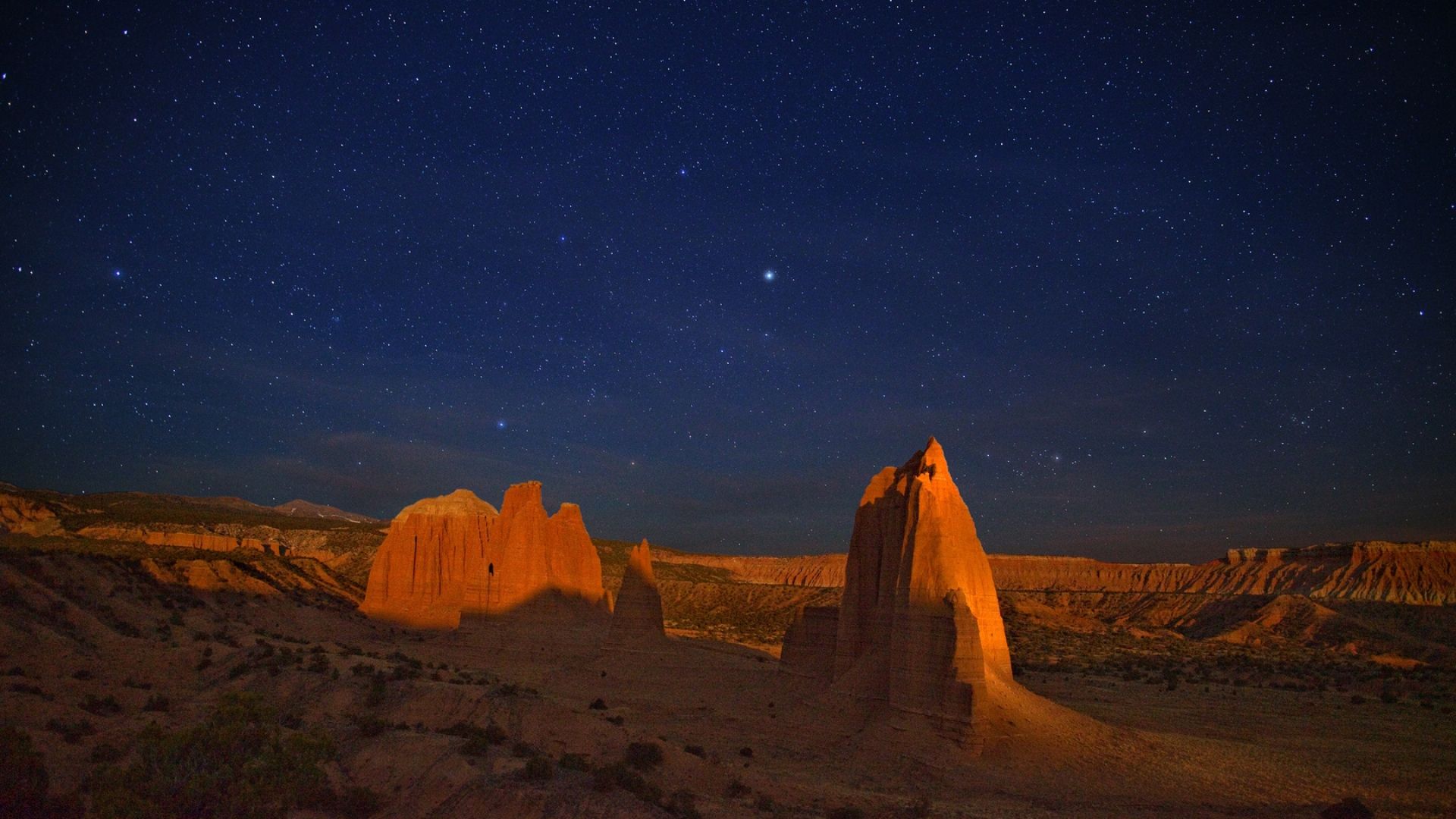 Download Wallpaper 1920x1080 canyon, desert, night, stars, sky, shadow Full HD 1080p HD Background