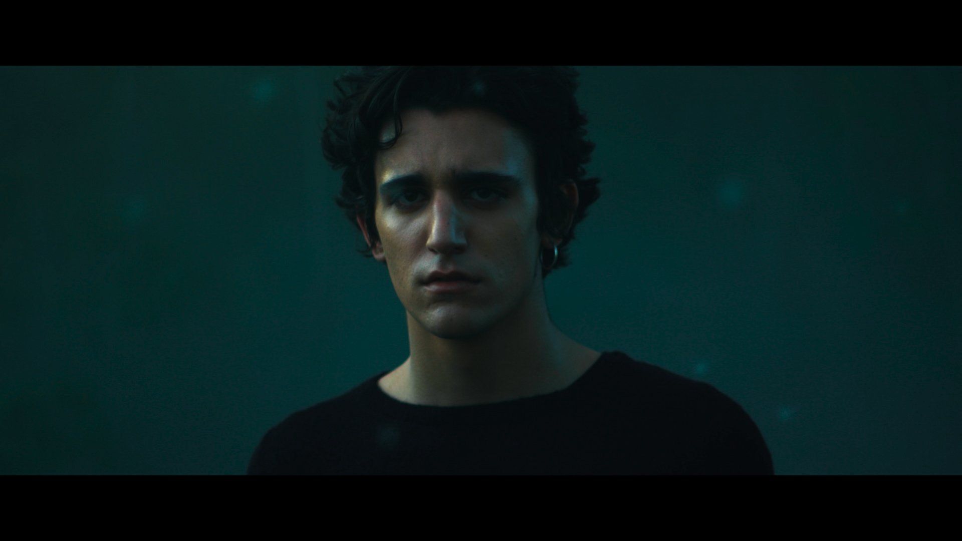 Tamino's the video for Sun May Shine. It's a song about two opposites. A conflict between a very apathetic, nihilistic character, and a very romantic, though vulnerable character. This