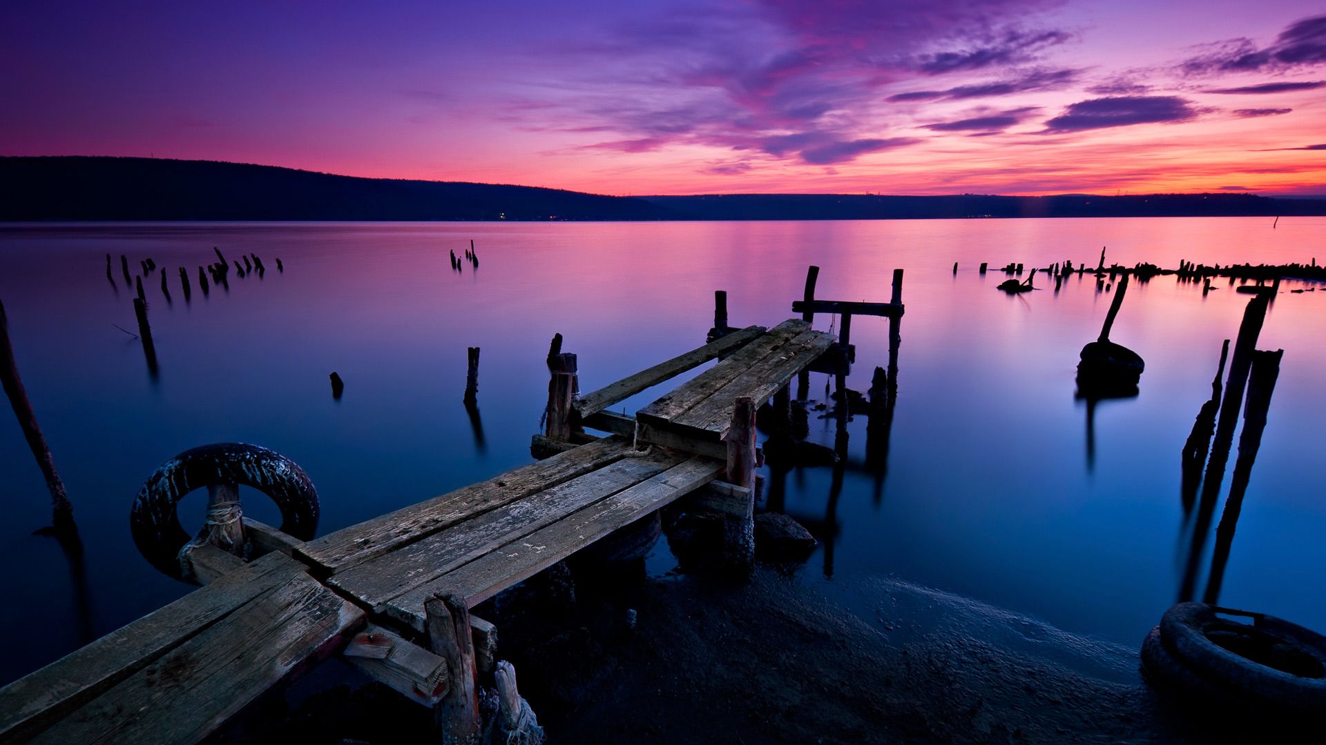 Long time exposure landscape with lake after sunset, Lake Varna, Bulgaria. Windows 10 Spotlight Image