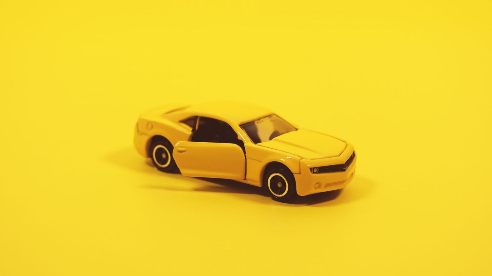 Yellow Toy Car Wallpaper