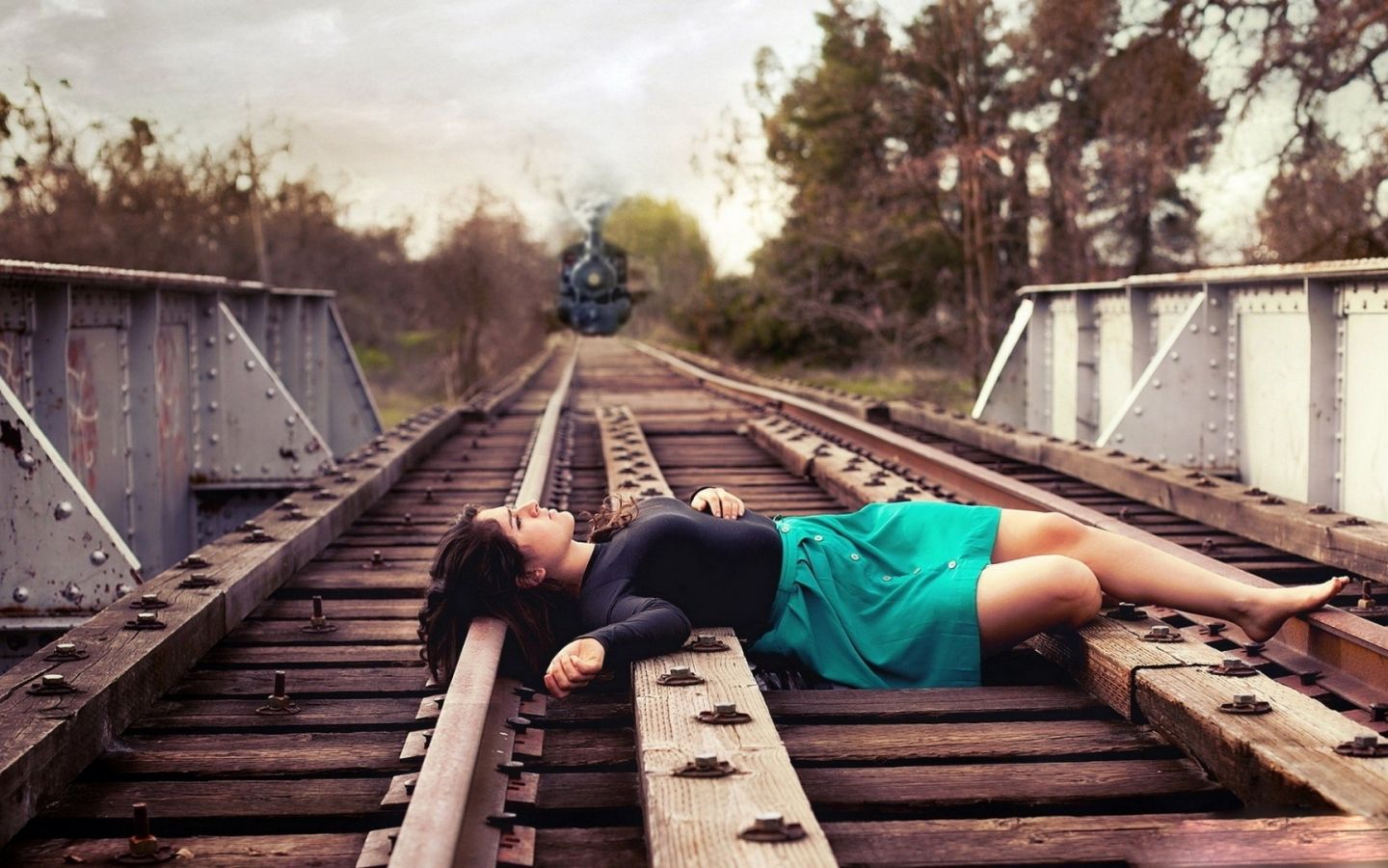 Sad Girl Lying on Railway Track Thinking Wallpapers.