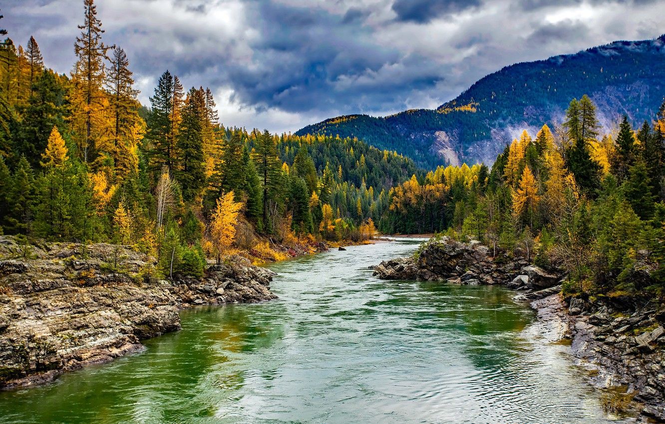 Wallpaper autumn, forest, the sun, clouds, trees, mountains, stones, Montana, USA, river, Glacier National Park, Glacier image for desktop, section пейзажи