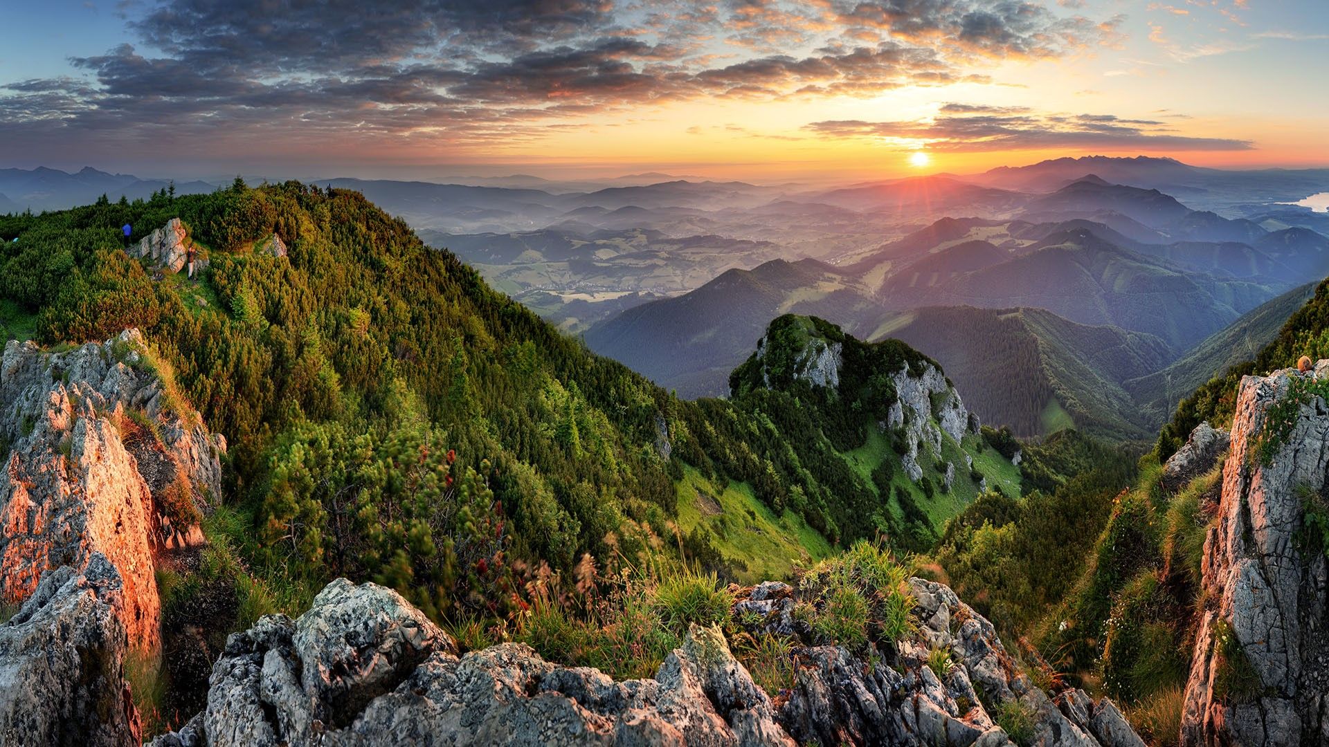 Mountain valley during summer sunrise view from Veľký Choč, Slovakia. Windows 10 Spotlight Image