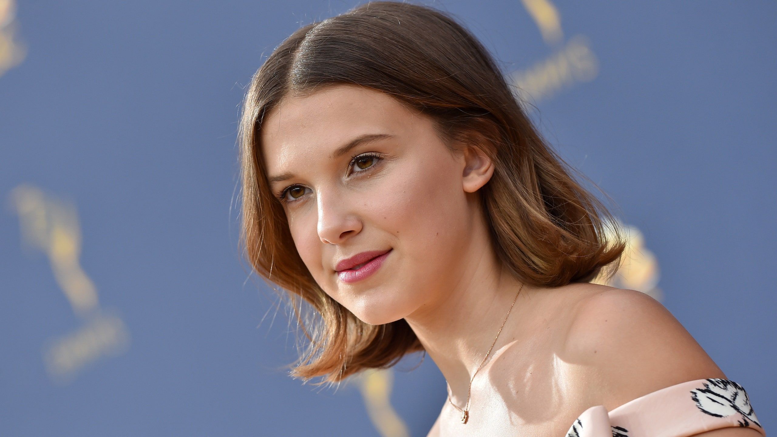 Millie Bobby Brown Reveals Long, Curly Hair For 'Enola Holmes' Movie