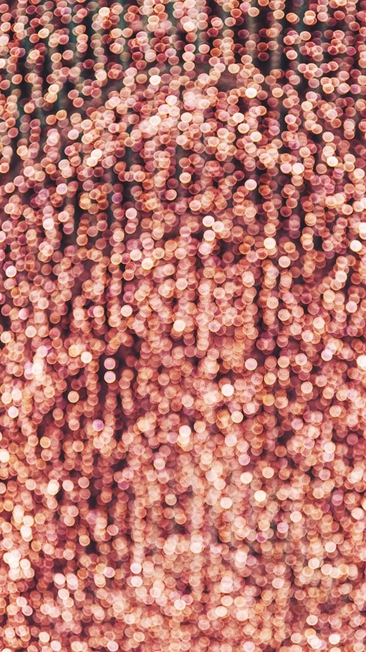 Coral pink sequins wallpaper shared