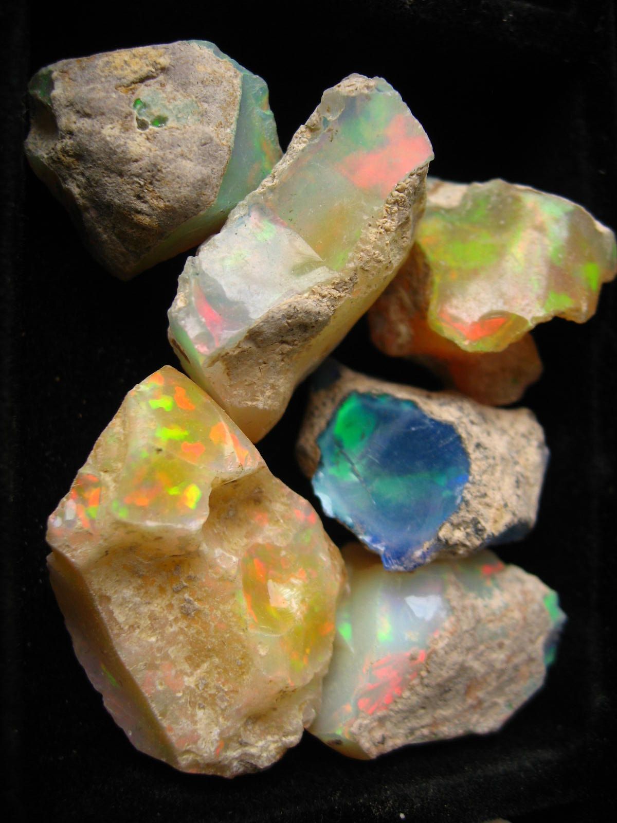 Opals in the rough. Raw opal, Minerals, Crystals