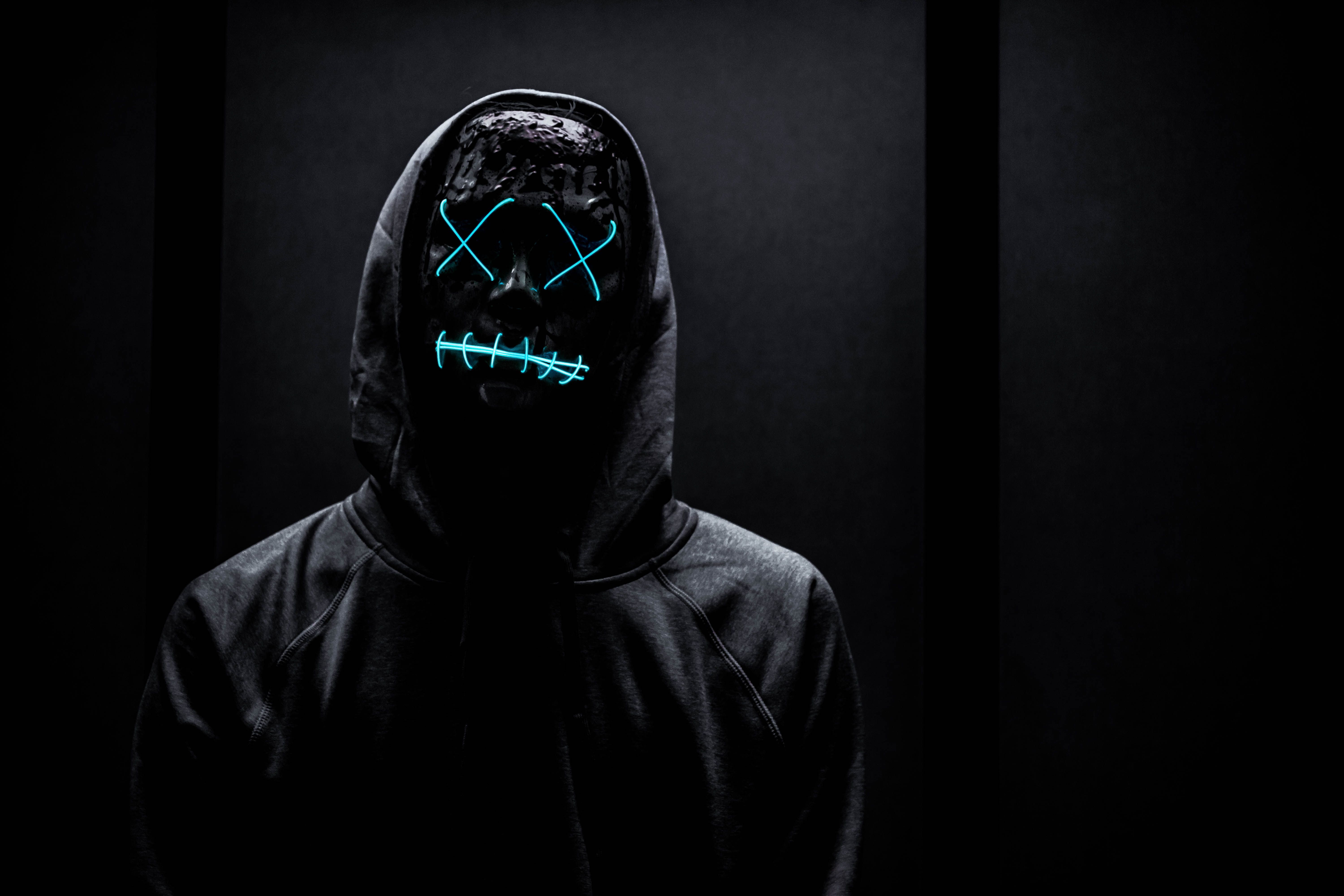 Neon Mask 4K Wallpaper, Man in Black, Dark background, Hoodie, Blue light, 5K, Photography