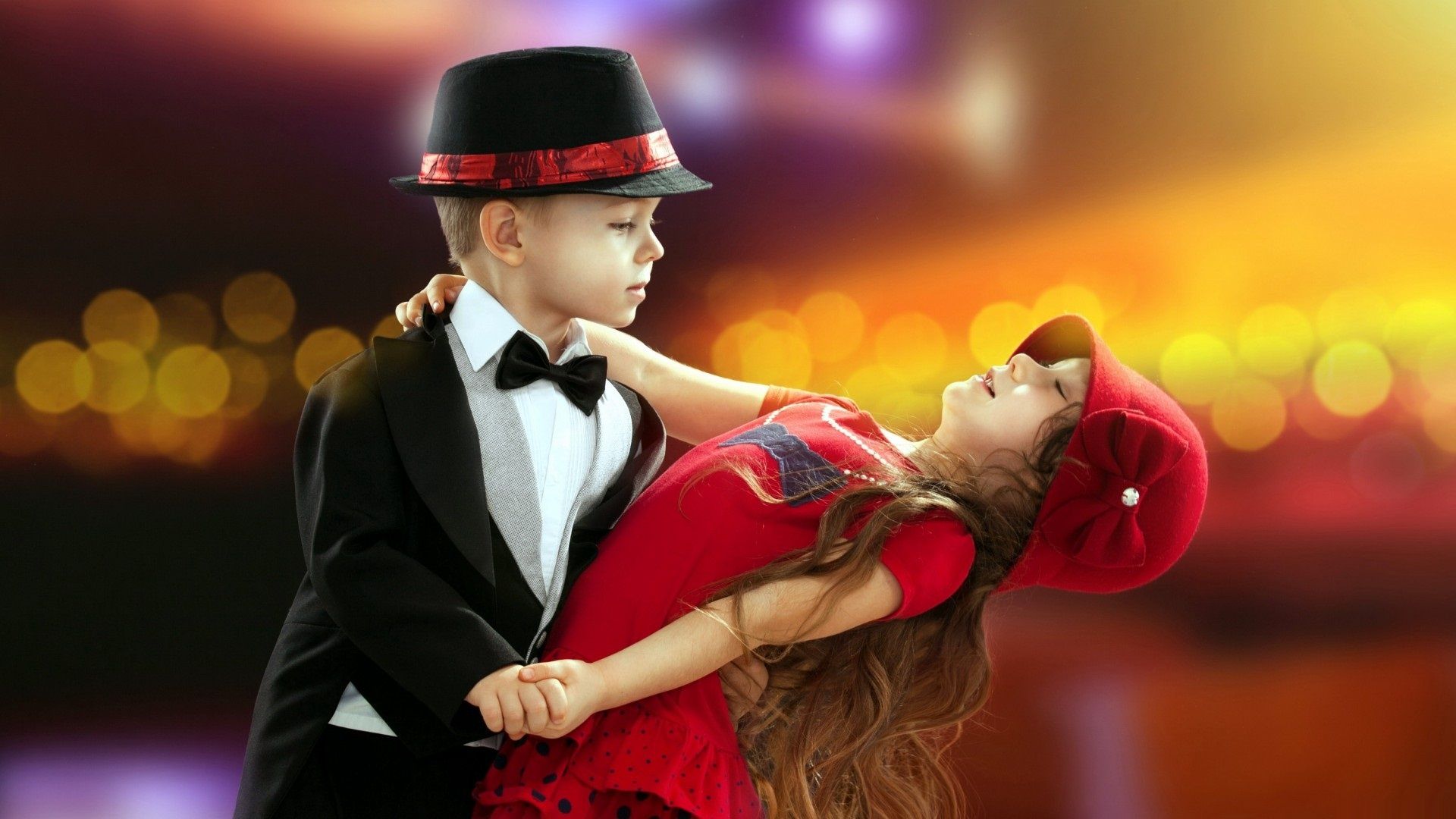 Lovely Little Boy And Girl Dancing Wallpaper