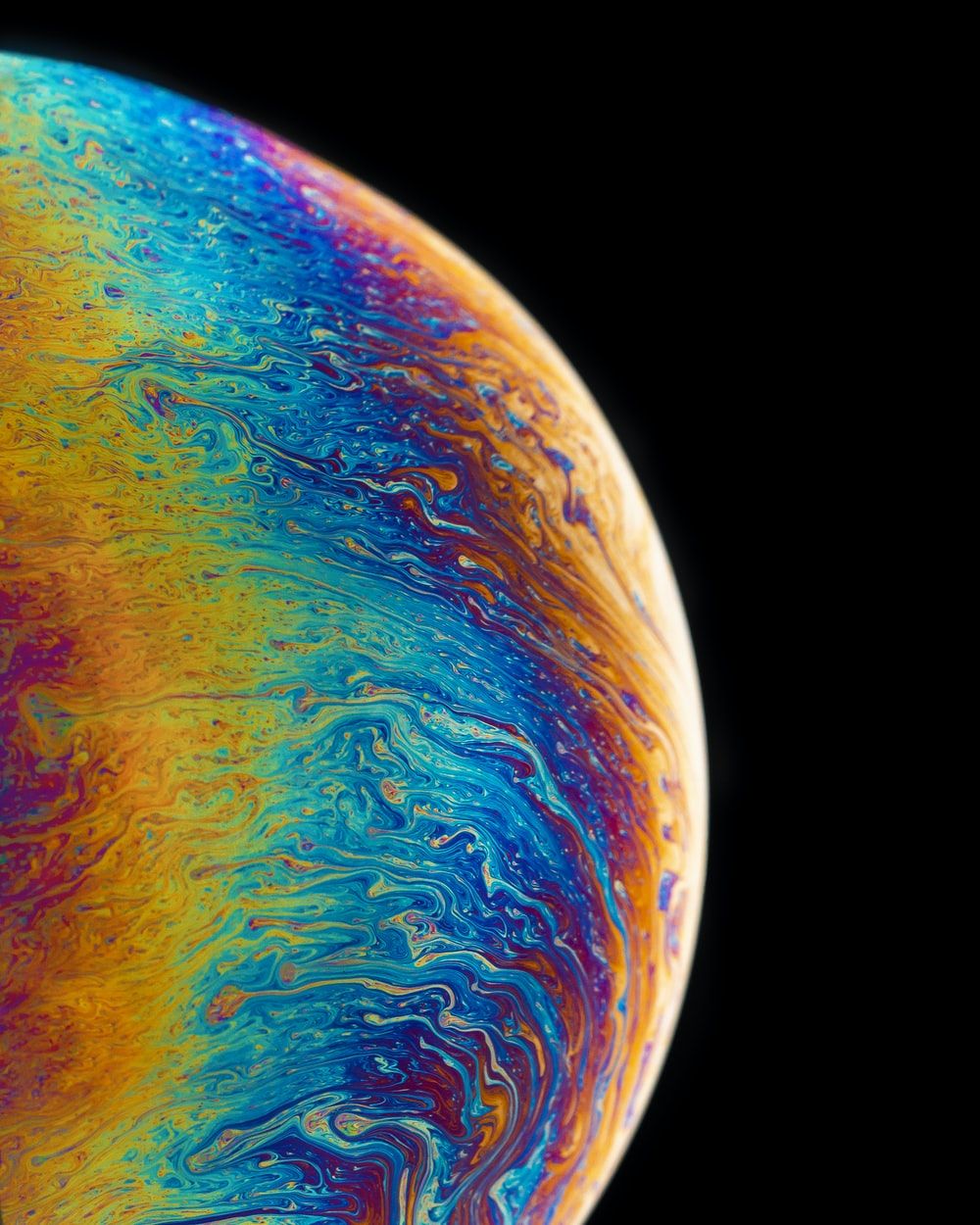 multicolored planet fluid painting photo