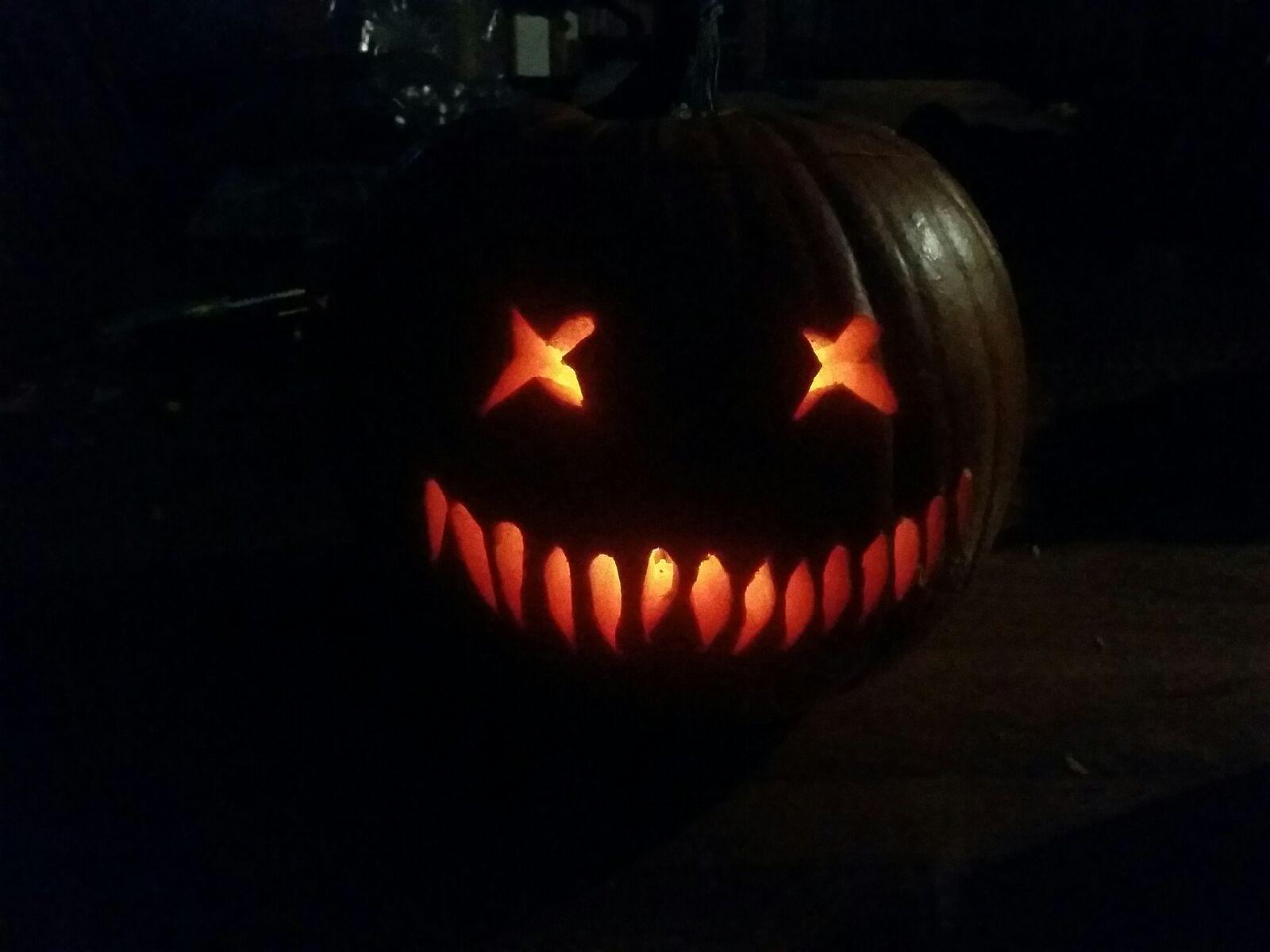 Last night's pumpkin carving, is Sam's Trick 'r Treat pumpkin. I Love it!