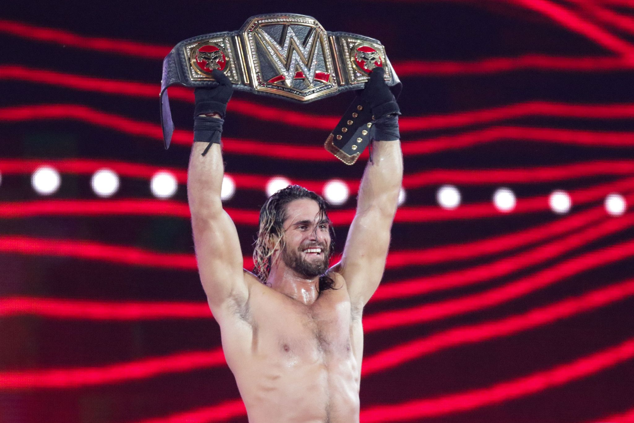 Seth Rollins walks out of WrestleMania as WWE champion