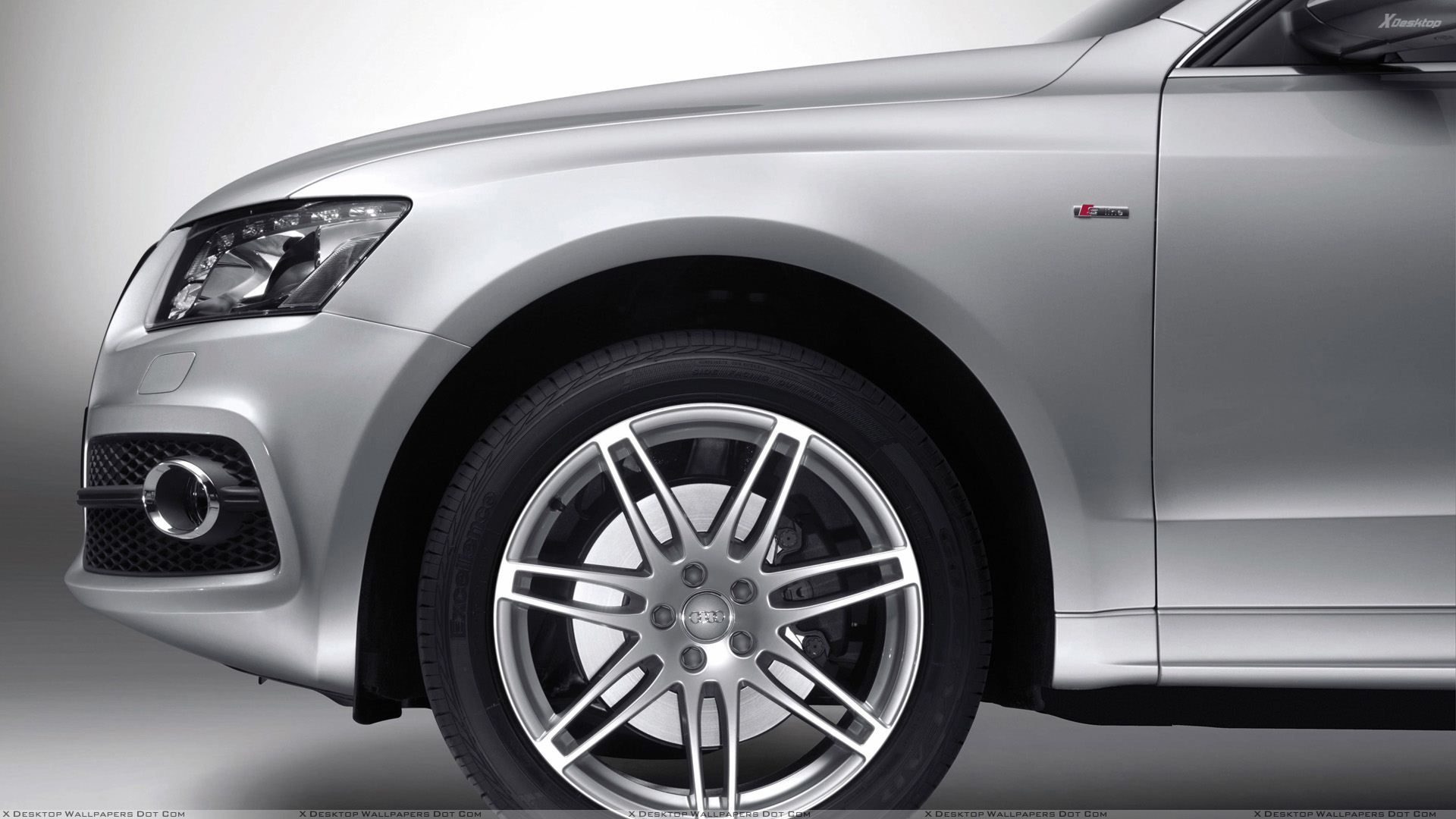 Silver Audi Q5 Tyre Closeup Wallpaper