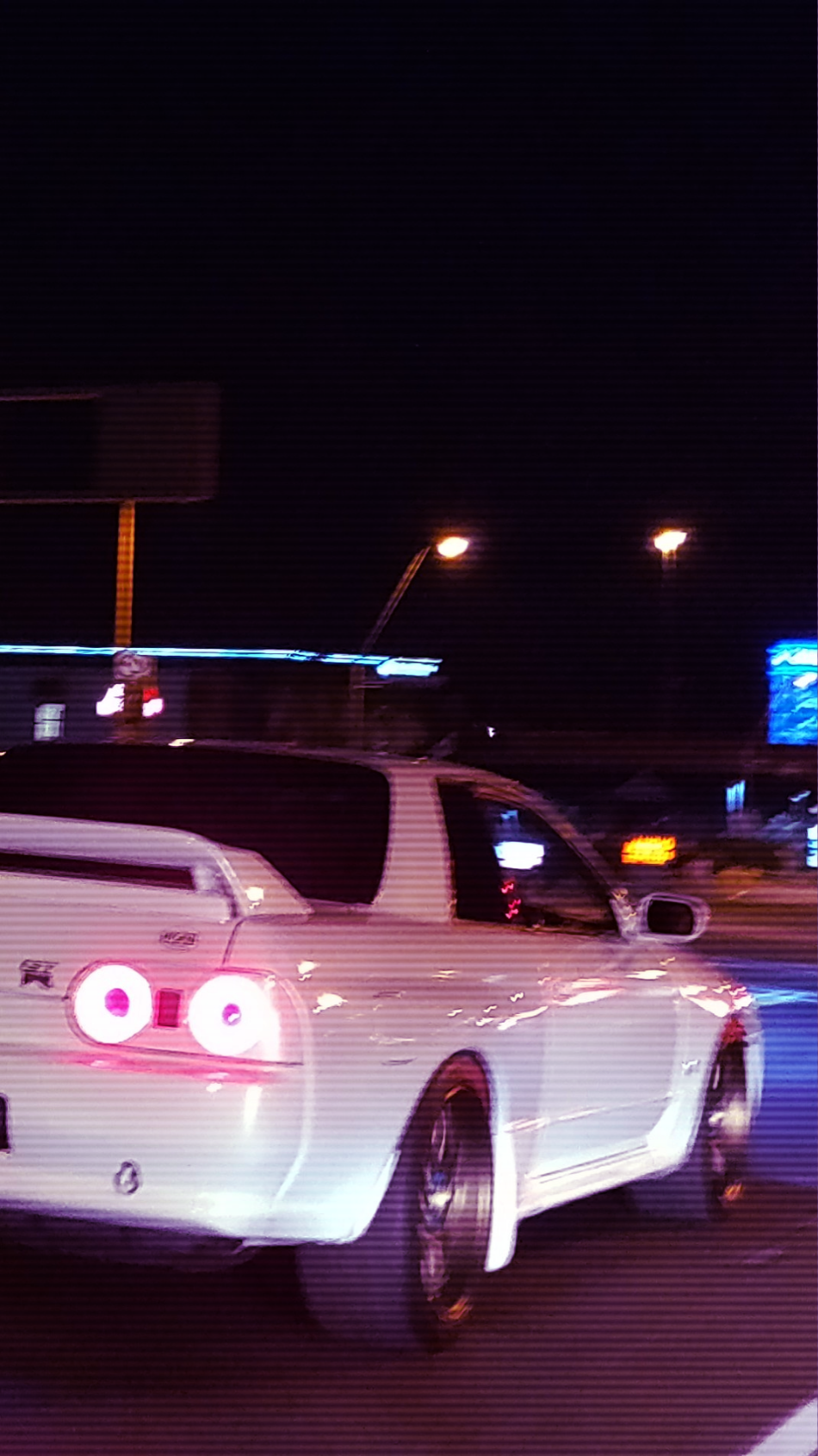 I made this phone wallpaper out of a roller I got of my buddies R32 GTR Nismo. Figured I'd share!