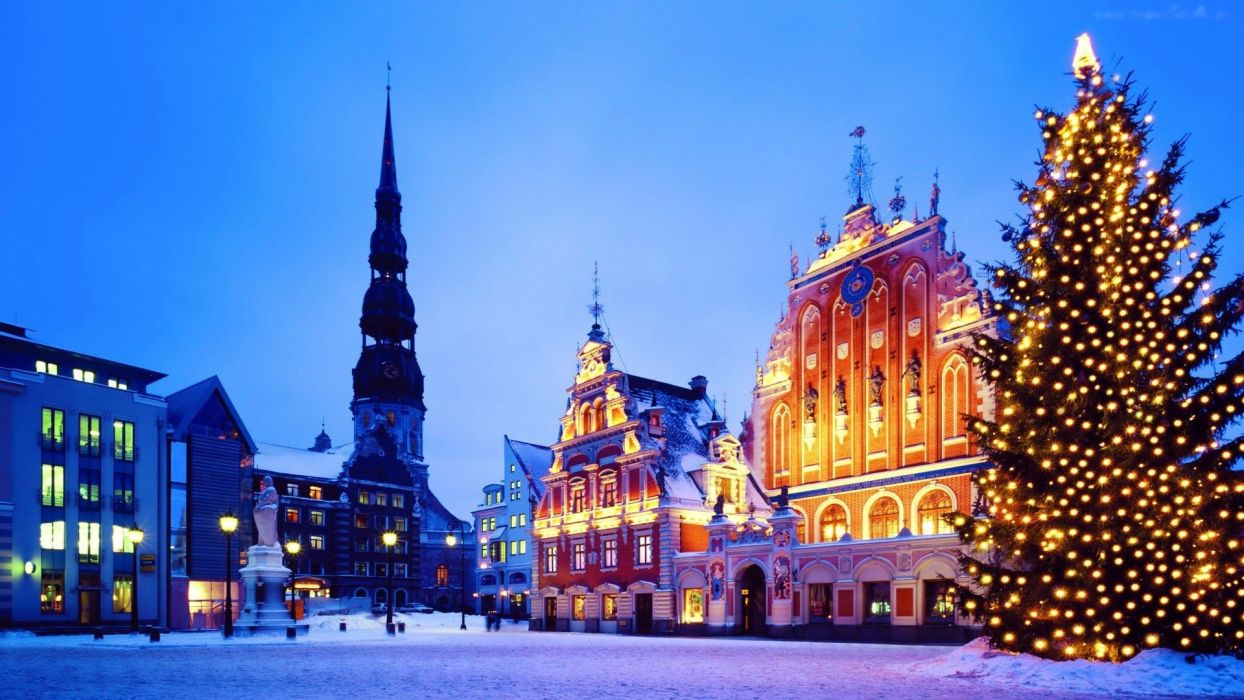 Riga Latvia buildings houses church bell tower square tree tree lights night sunset city wallpaperx1080