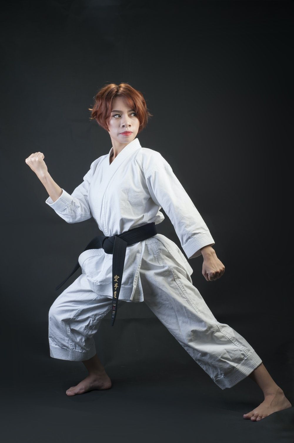 woman wearing karate gi photo