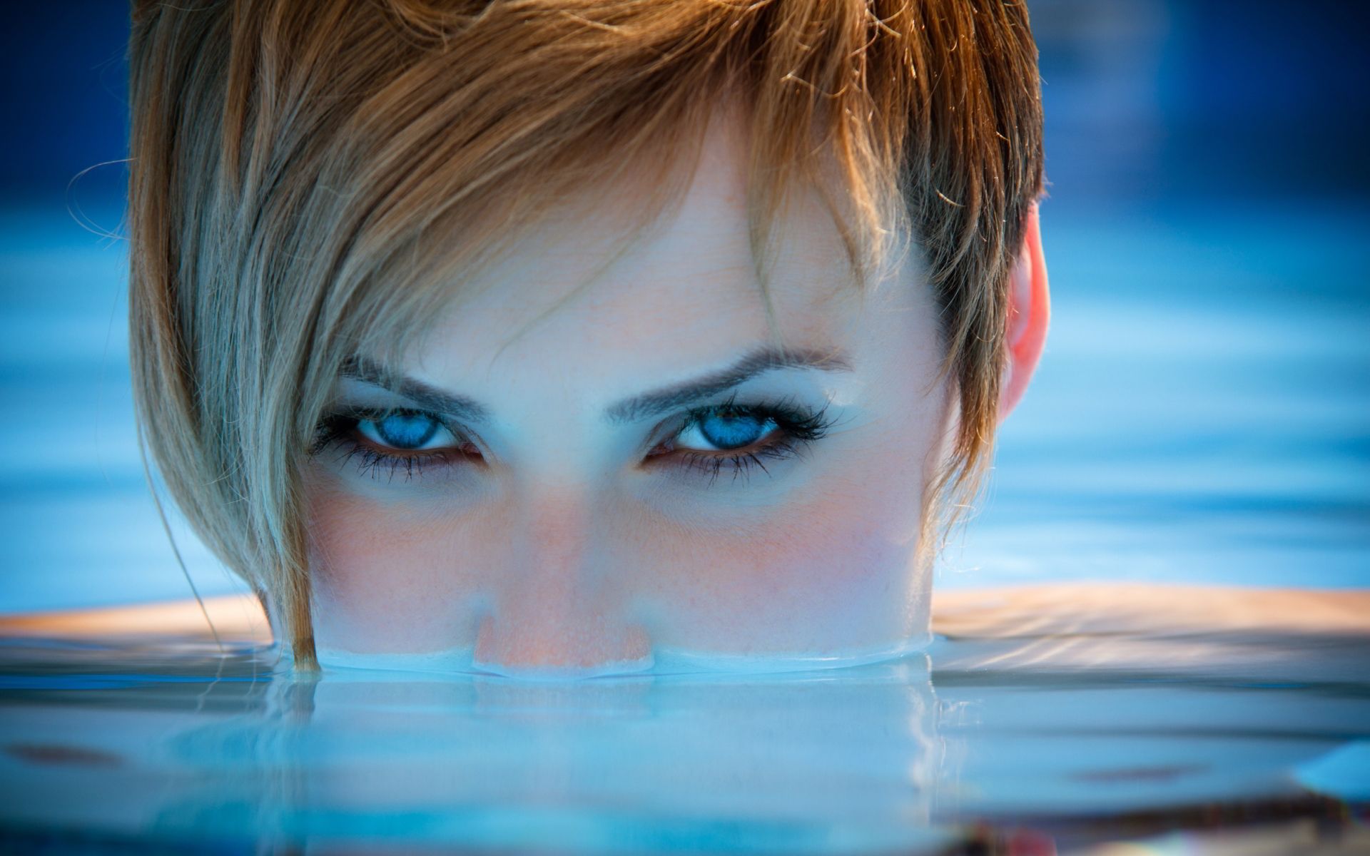 Woman pool blue eyes