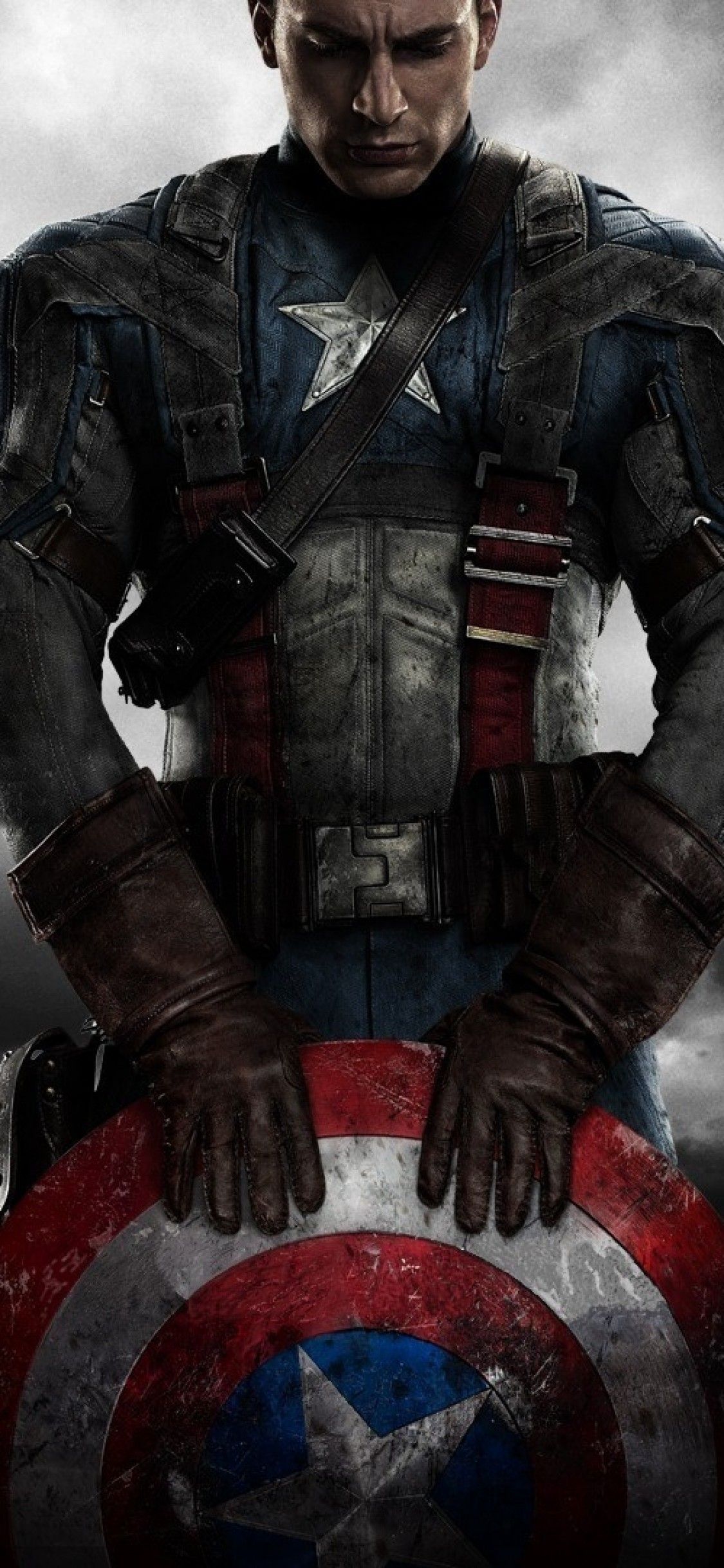 Download 1125x2436 Captain America: The First Avenger, Chris Evans, Shield, Clouds Wallpaper for iPhone X