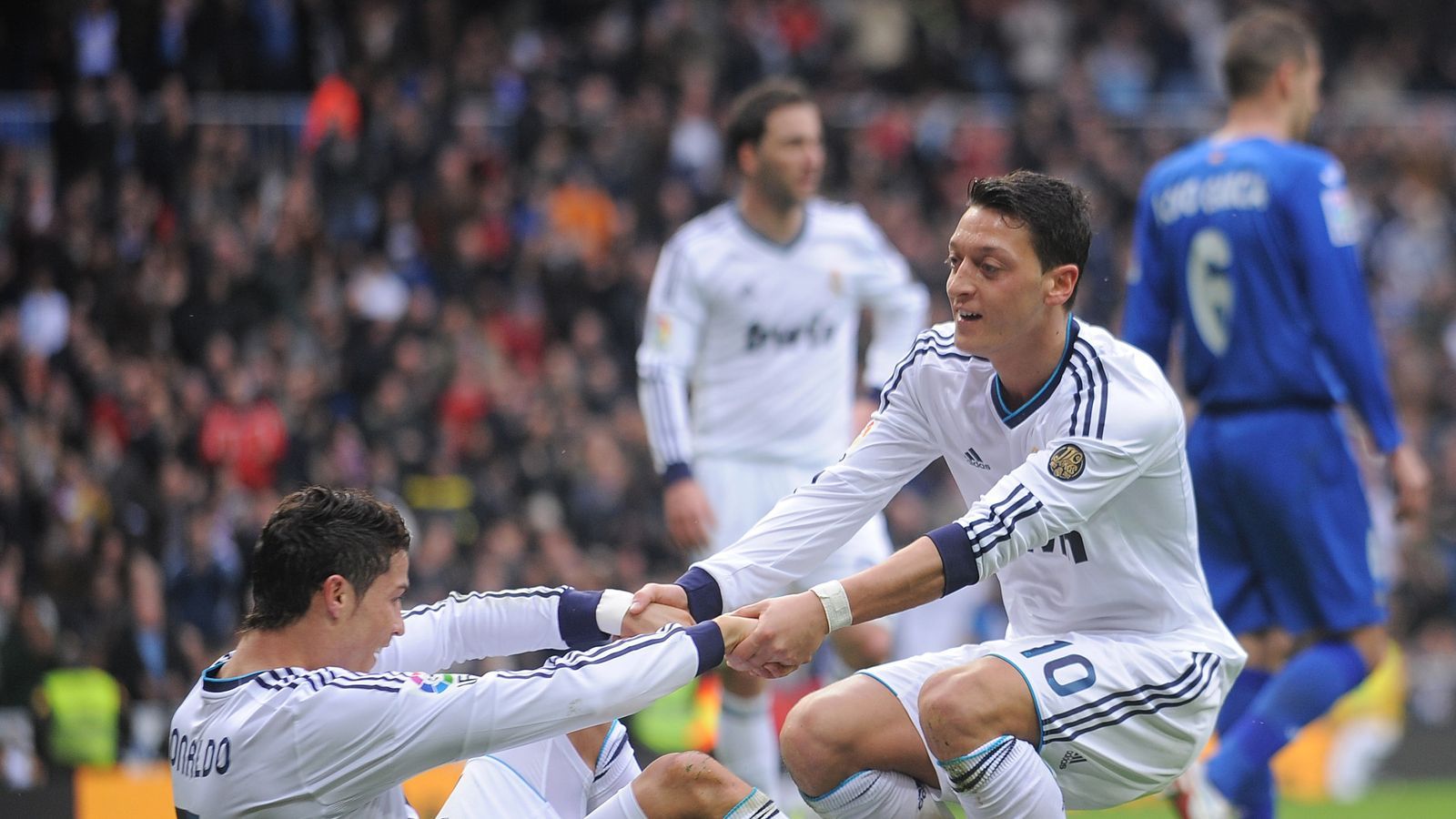 Mesut Ozil: I gave Cristiano Ronaldo assists, but he made me better