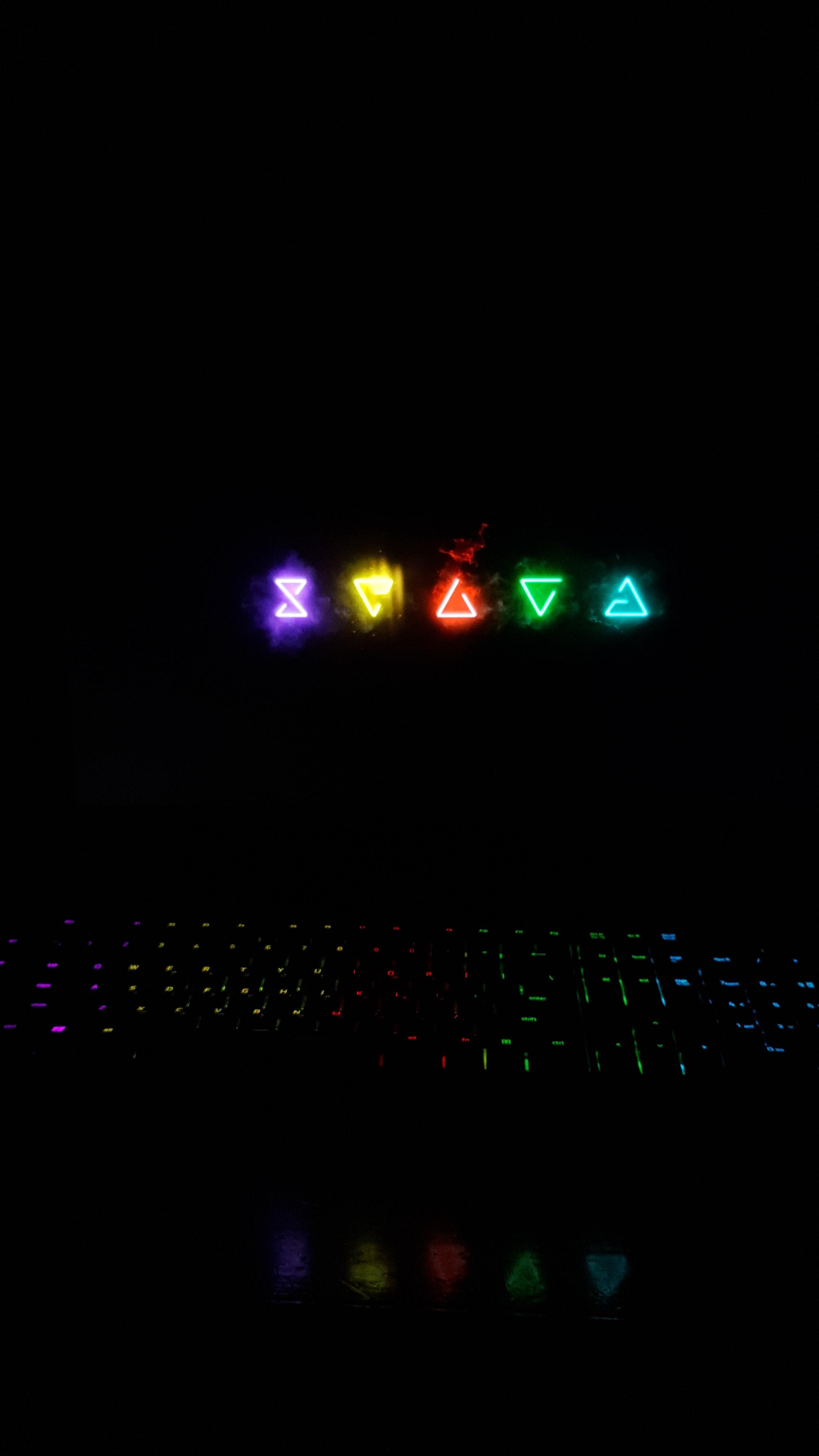 Idk why but this looked so cool. The keyboard would've been brighter but then the signs on my monitor wouldn't be visible. The wallpaper is not mine but you can find it