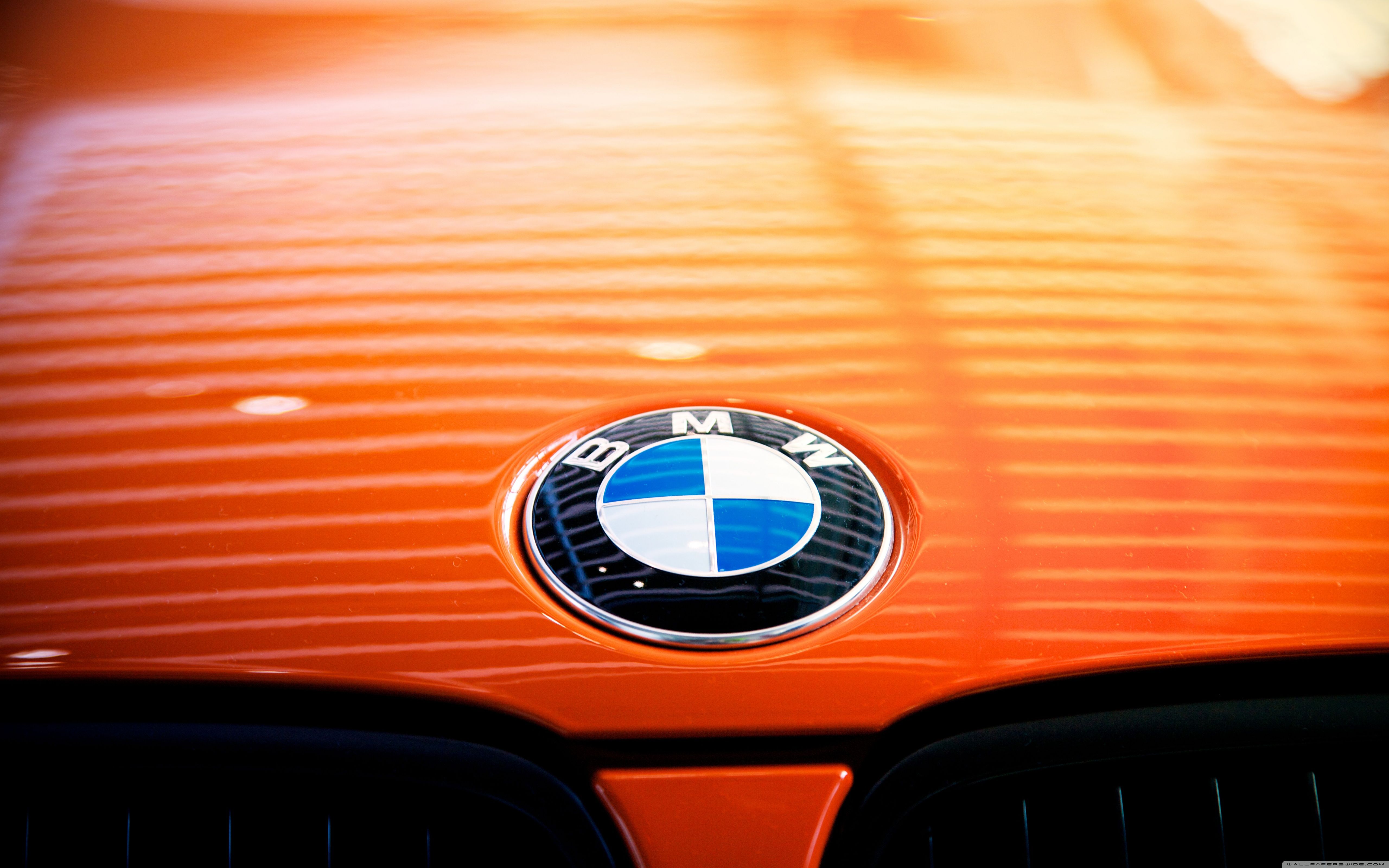 Orange BMW Beast wallpaperx3200