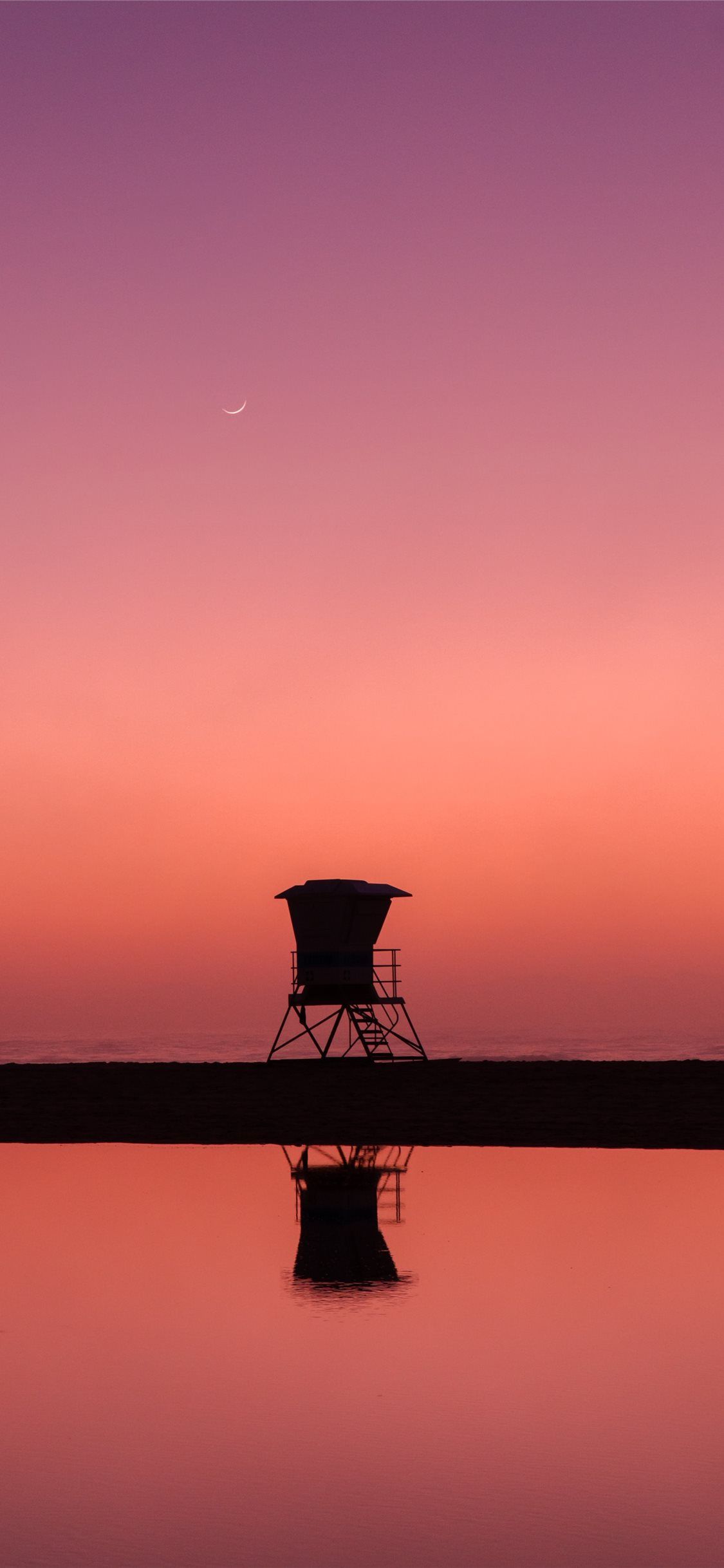 silhouette photo of lifeguard house iPhone X Wallpaper Free Download