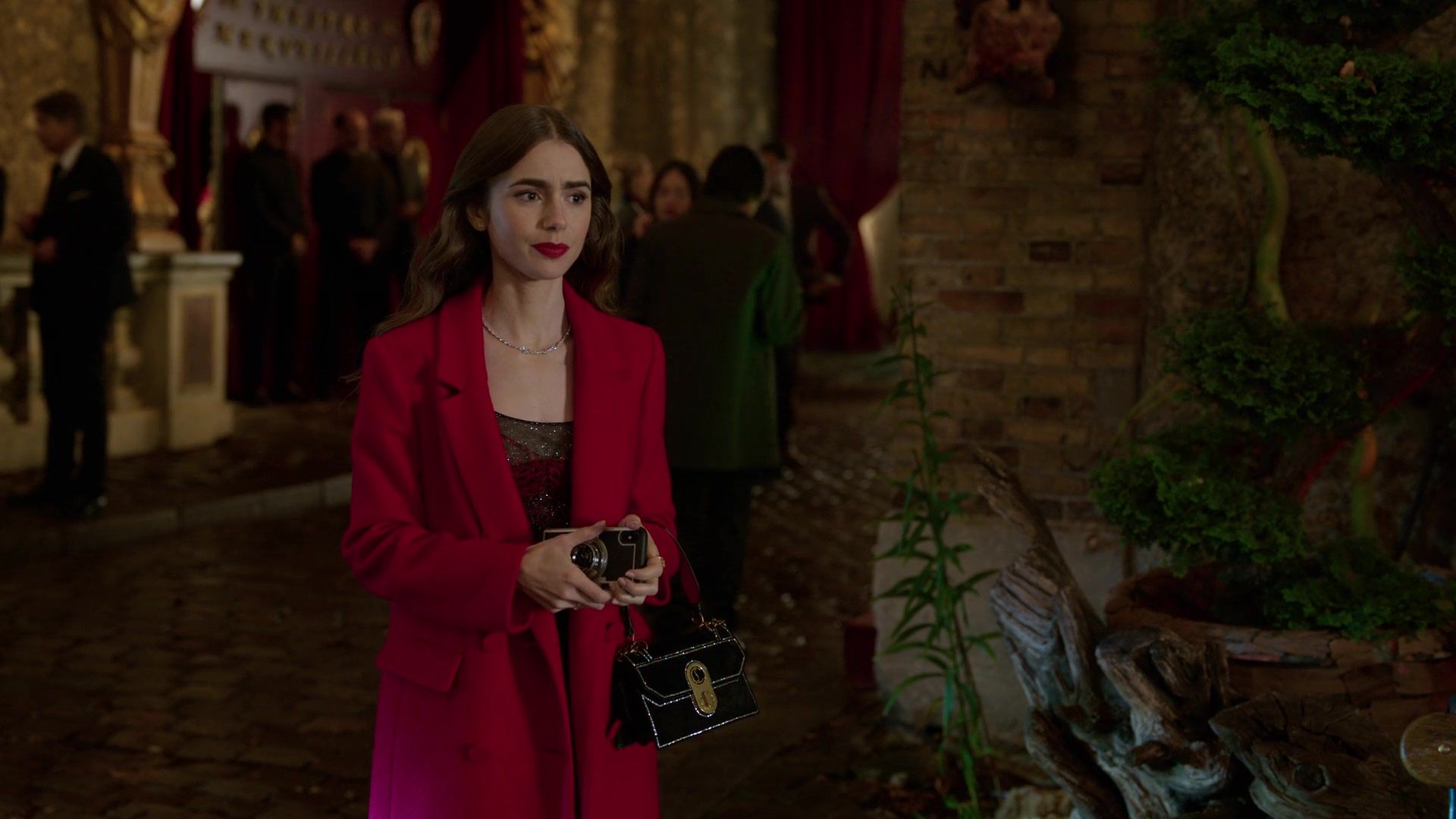 Christian Louboutin Handbag of Lily Collins in Emily in Paris S01E07 French Ending