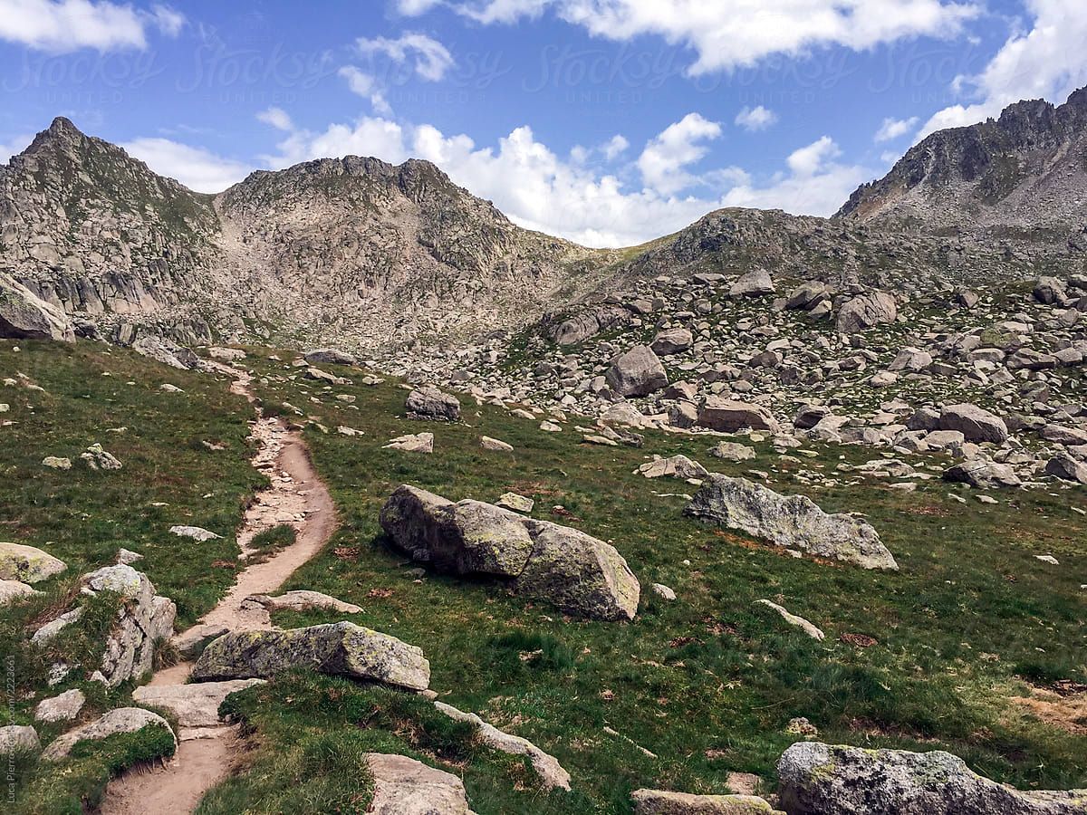 Rocky Path On The Pyrenees While Walking The GR11 Path By Sky Blue Image