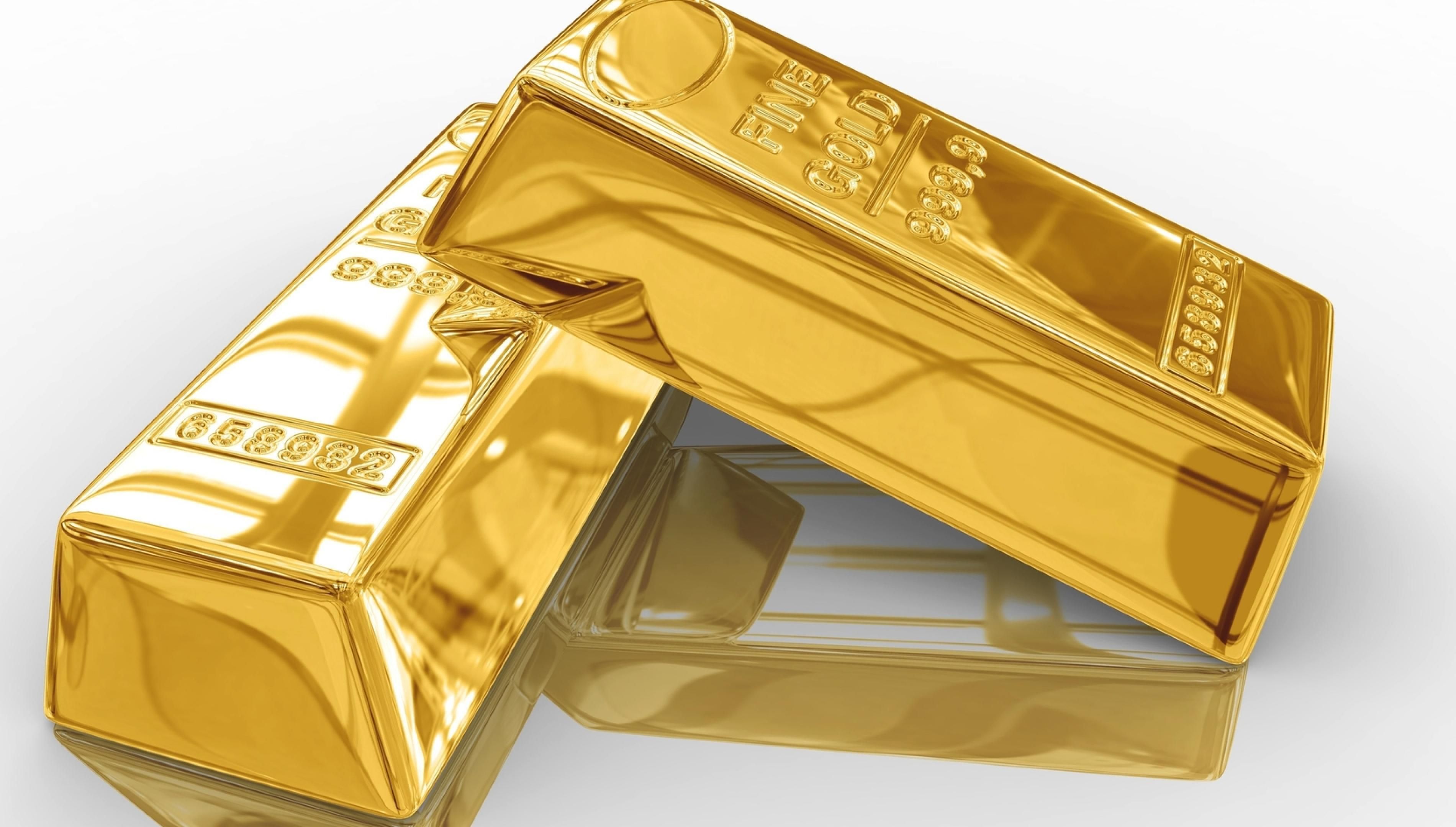 Two large gold bars are reflected in the surface. Desktop wallpaper 1024x768