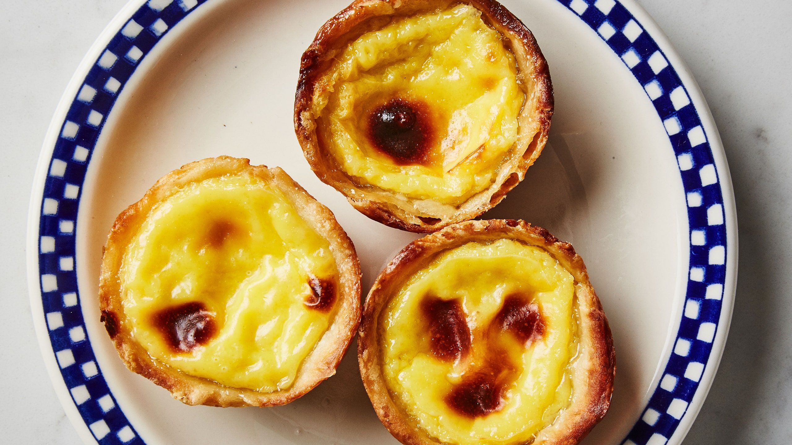 A Portuguese Egg Tart Recipe You Can Make in a Muffin Pan. Bon Appétit
