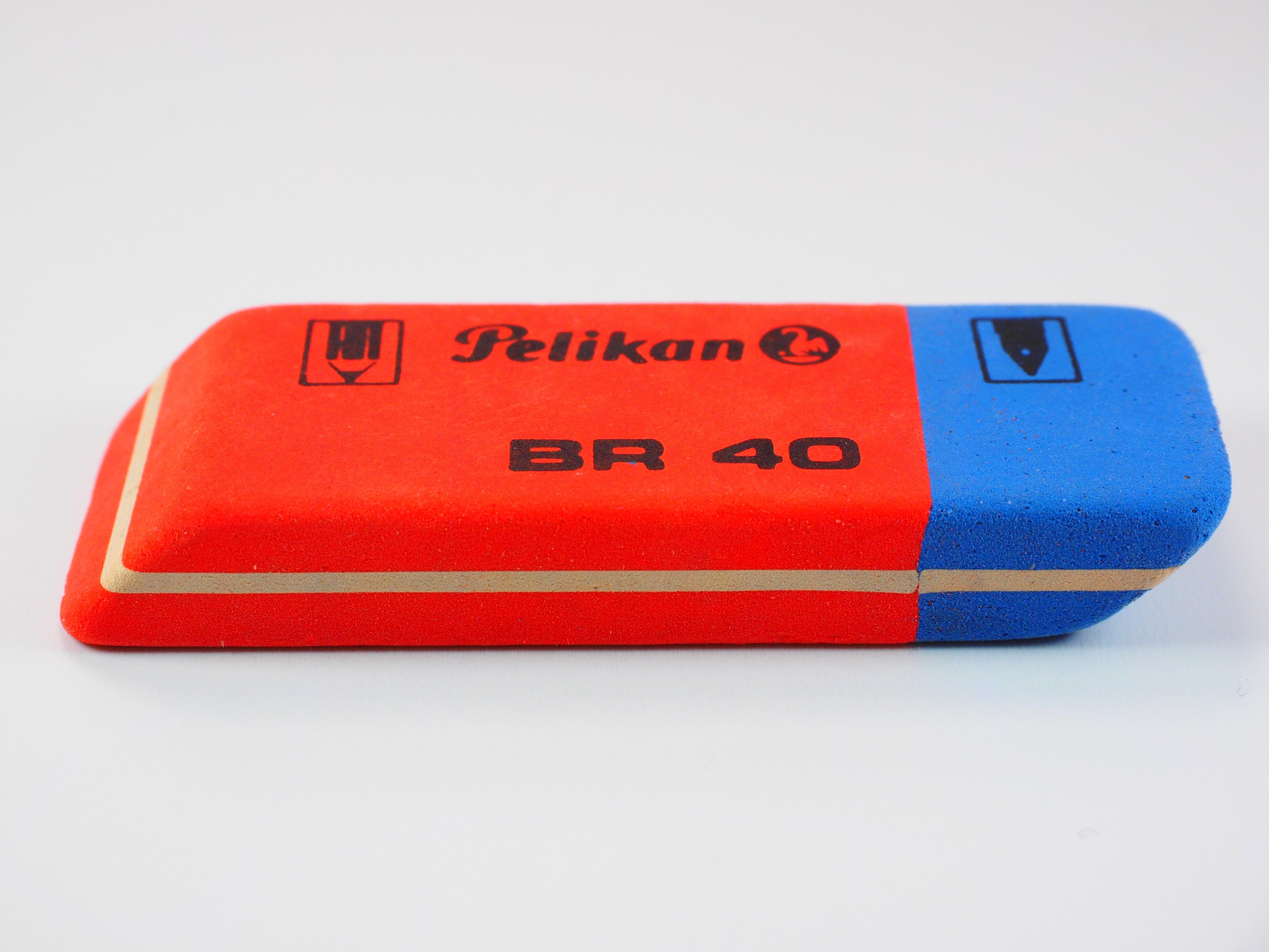 Red and Blue Pelikan Br 40 Eraser on White Surface · Free