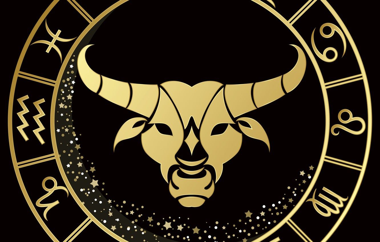  A golden bull representing the Taurus zodiac sign is placed in the center of the image with a black background and surrounded by a circle of stars and other zodiac symbols.