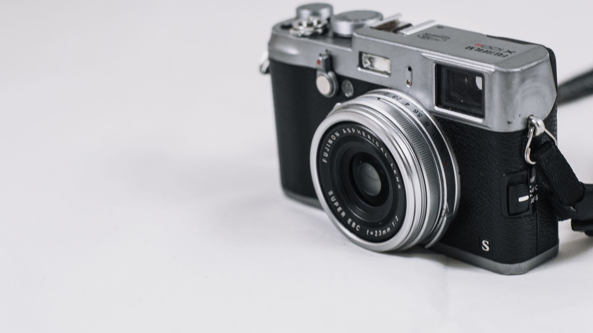 Silver and Black Film Camera Wallpaper