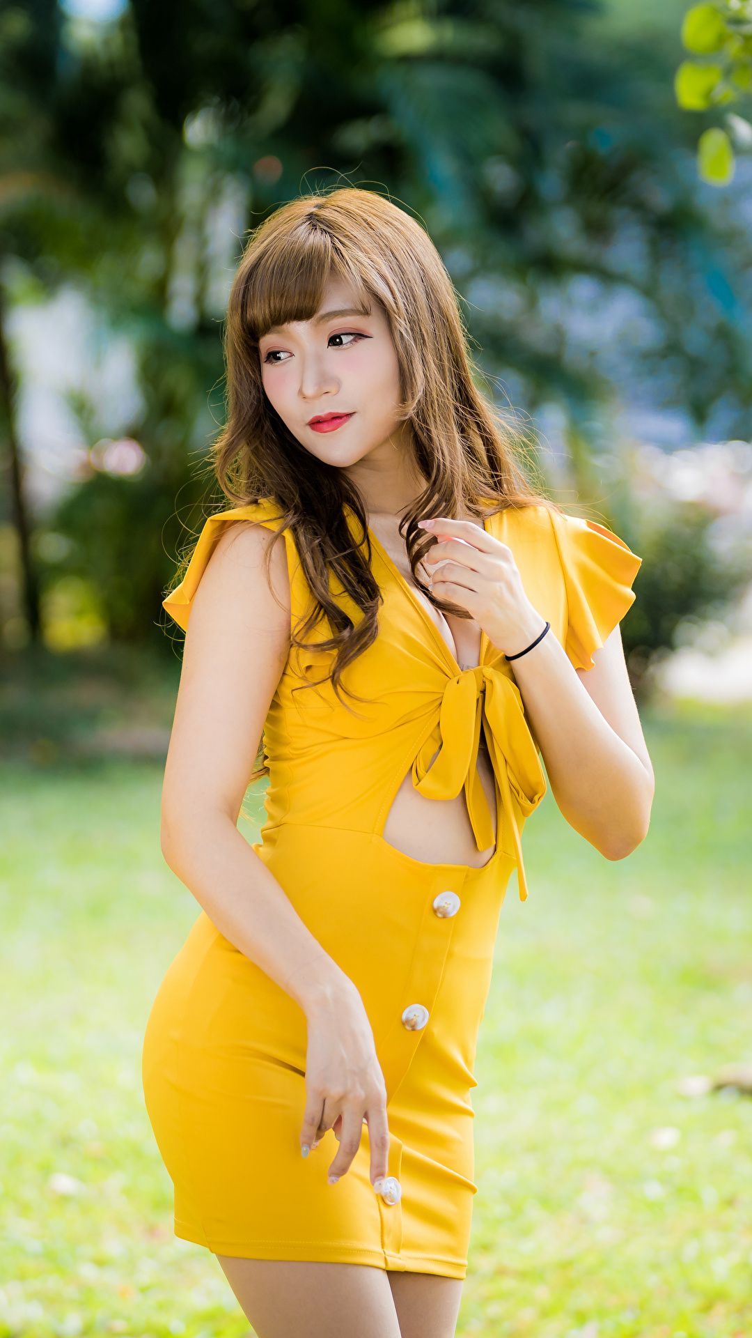 Desktop Wallpaper Bokeh Pose female Yellow Asian Dress 1080x1920