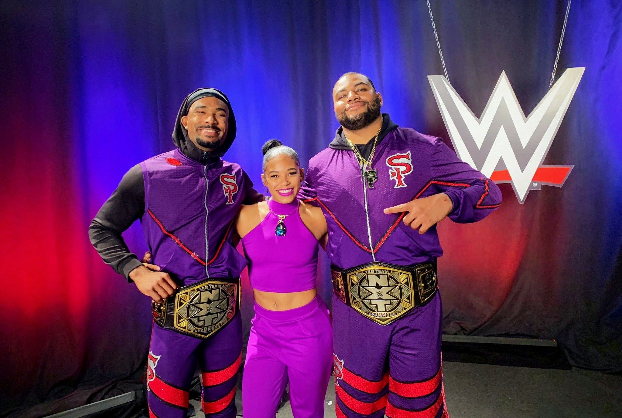 Bianca Belair and her husband Montez Ford and Angelo Dawkins NXT Tag Team Champions