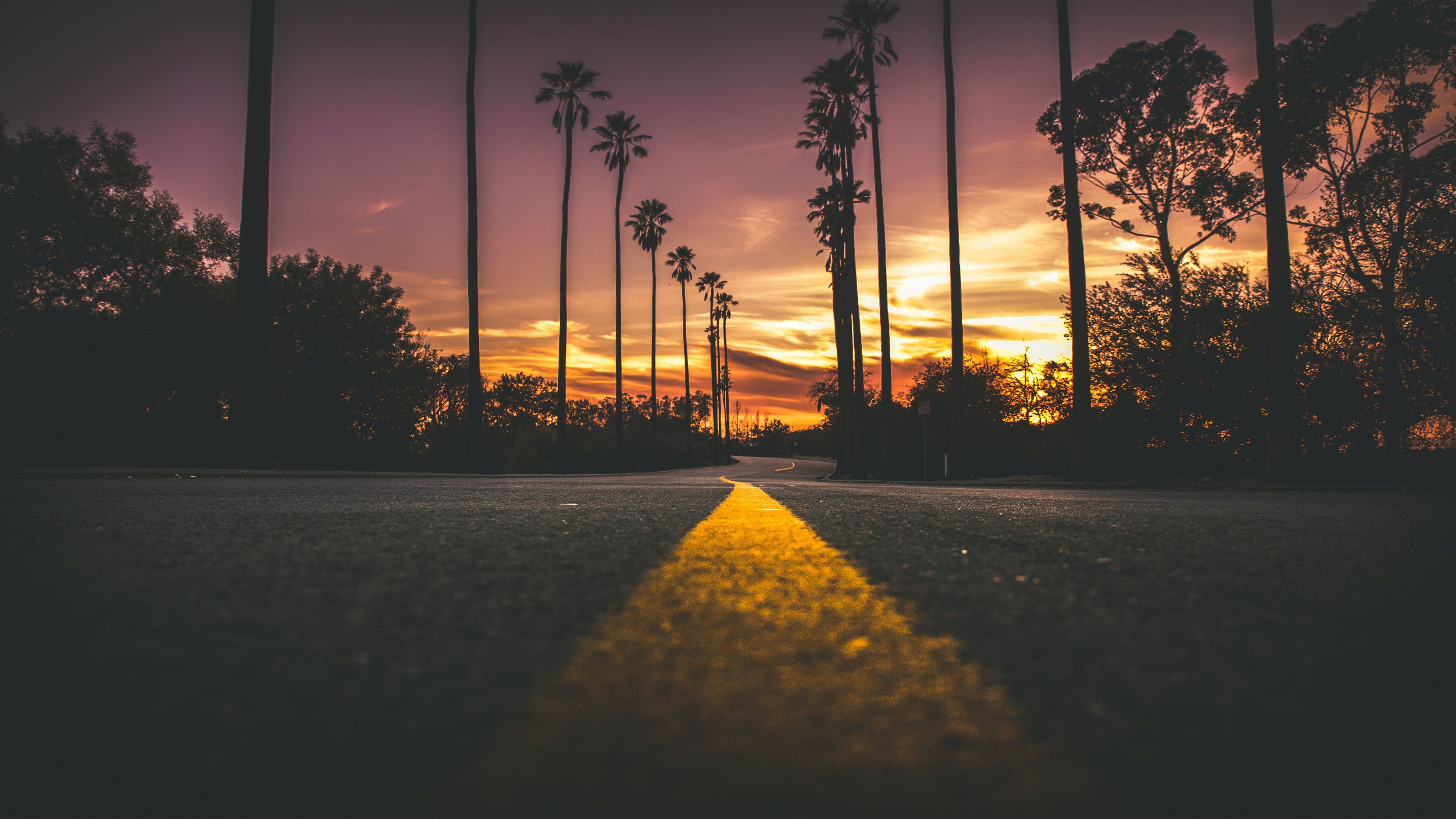 Road In City During Sunset 4K HD Wallpaper