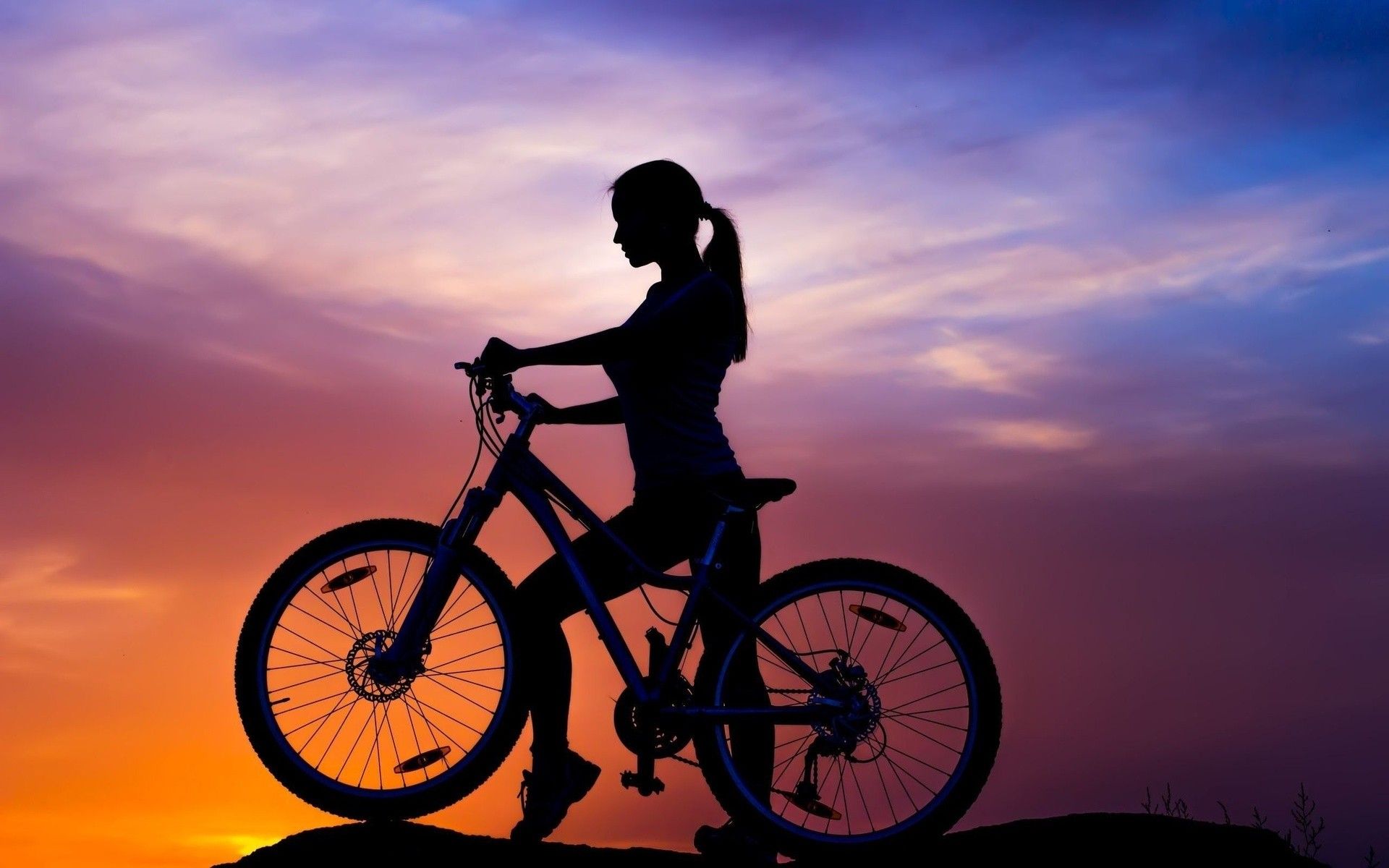 #women outdoors, #sneakers, #brunette, #women, #colorful, #sporty, #nature, #sunset, #tank top, #ponytail, #bicycle, #bare shoulders, #clouds, #silhouette, #model, #long hair, #hills, wallpaper. Mocah.org HD Desktop Wallpaper