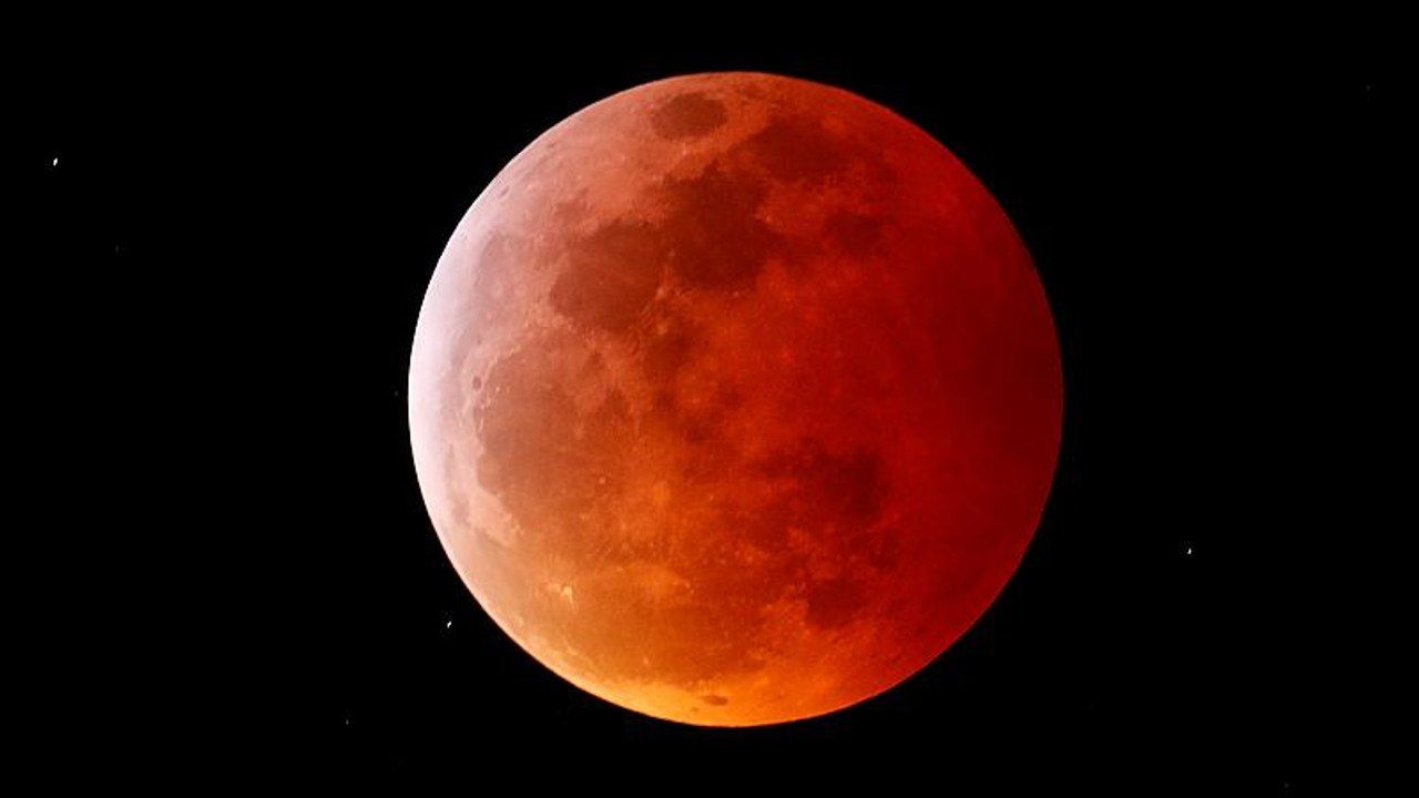 Super blood wolf moon': the best image as total lunar eclipse wows skygazers