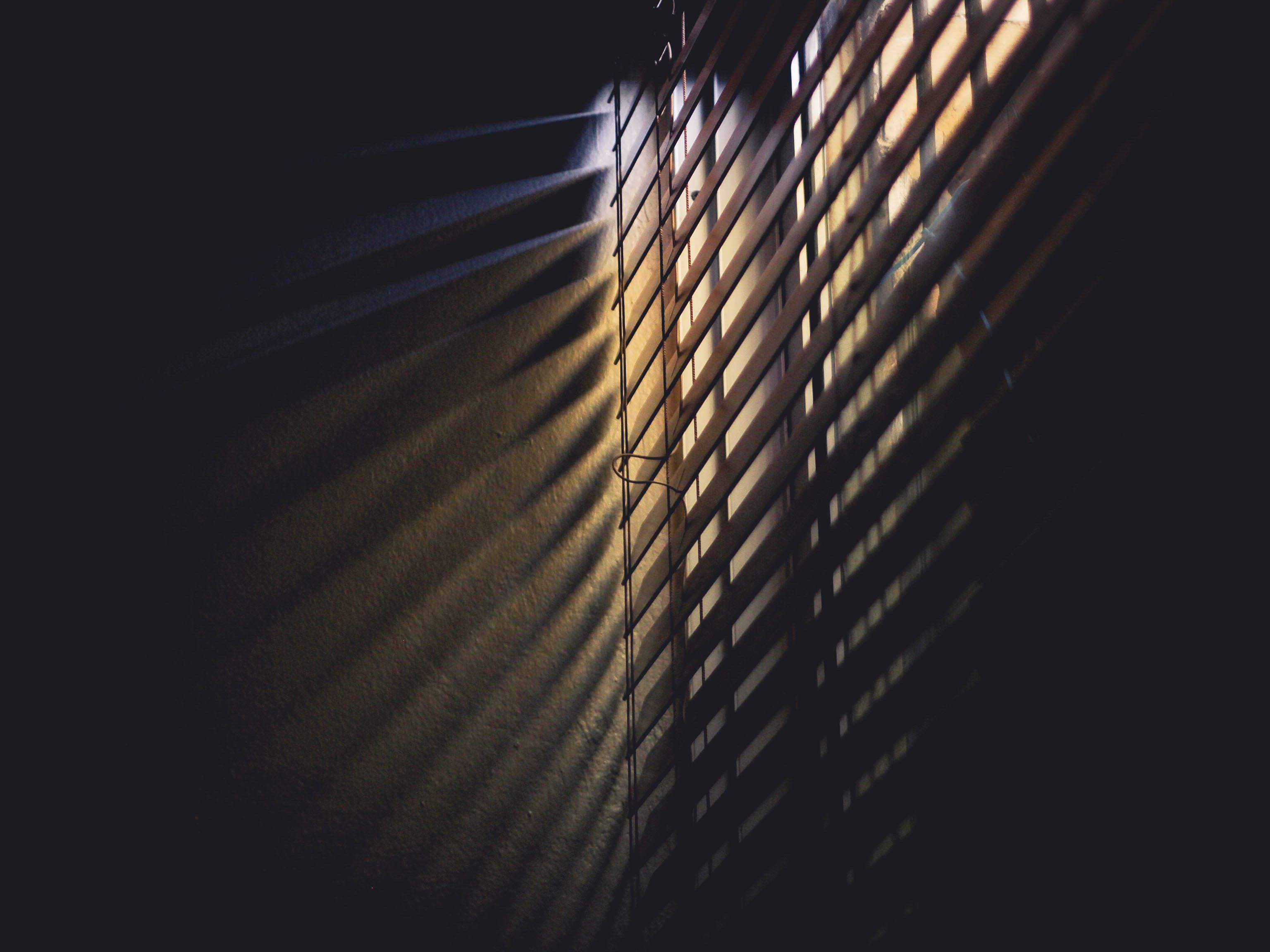 Low Light Photography of Brown Window Blinds · Free
