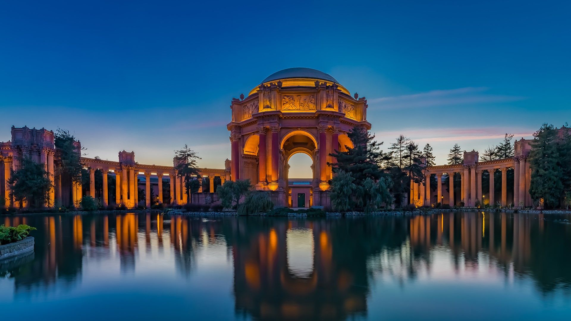 Illuminated Palace of Fine Arts at sunset in San Francisco, California, USA. Windows 10 Spotlight Image