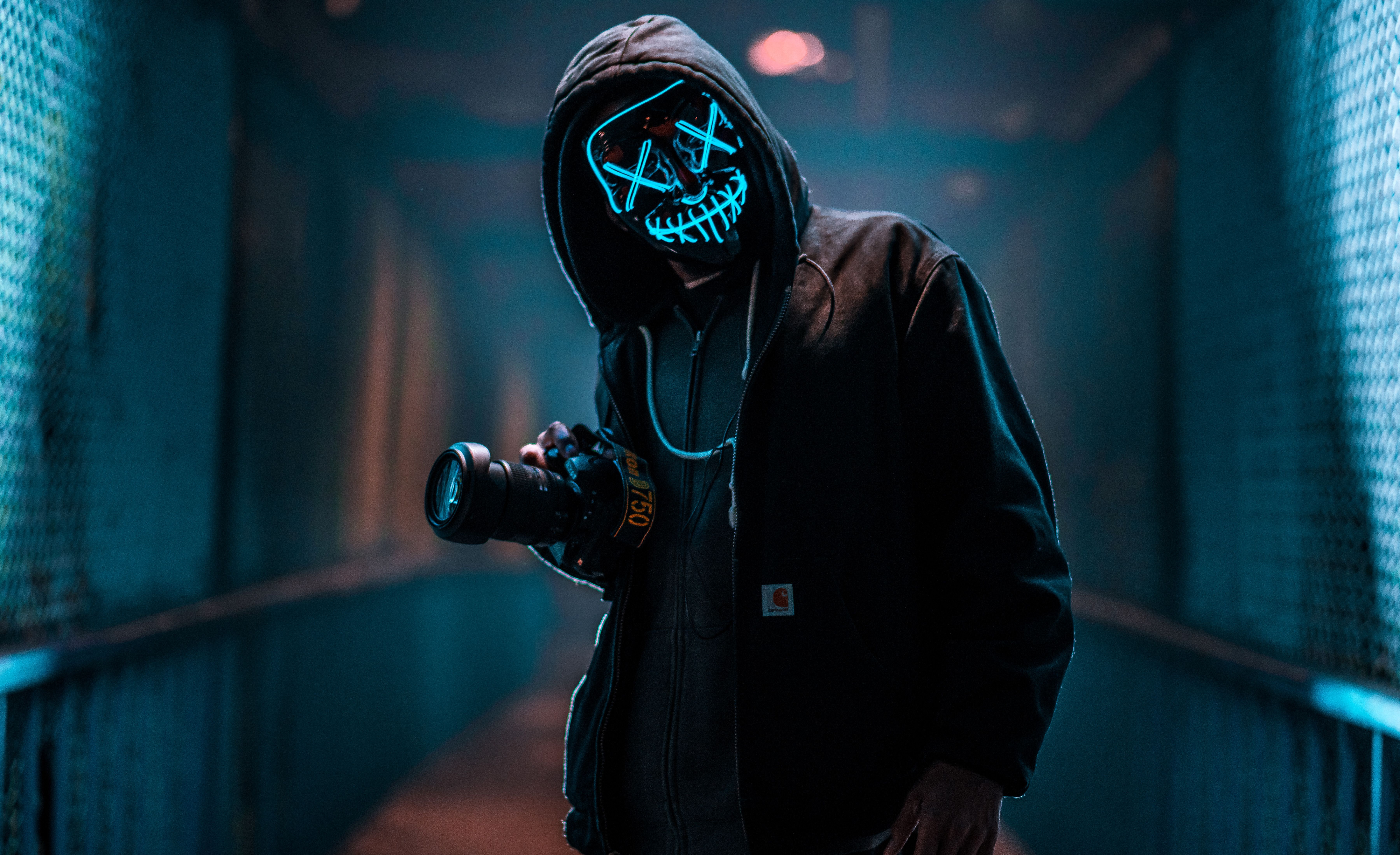 A guy in an anonymous neon mask with a camera Desktop wallpaper 1920x1200