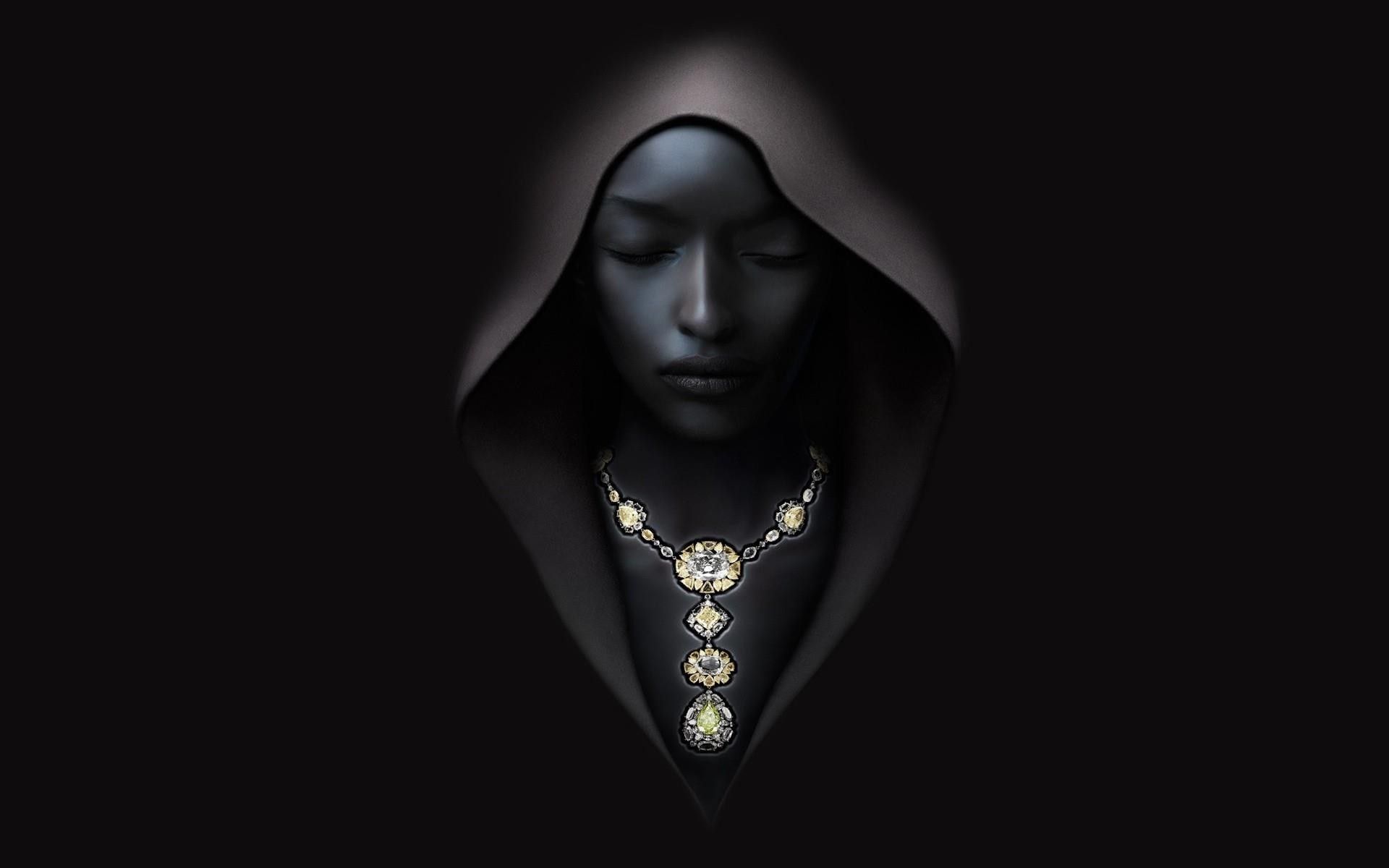 A girl in a hood on a black background wallpaper and image, picture, photo